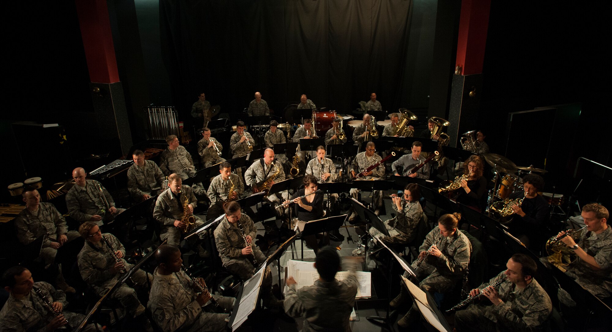 Members of the U.S. Air Forces in Europe Band rehearse their entire concert line up prior to one of their many tours, Nov. 6, 2013, Ramstein Air Base, Germany. The USAFE Band performs more than 400 times throughout the year. Through their performances and interactions with the public, they increase public awareness and understanding of the armed forces, enhancing trust and support. (U.S. Air Force photo/Senior Airman Damon Kasberg)