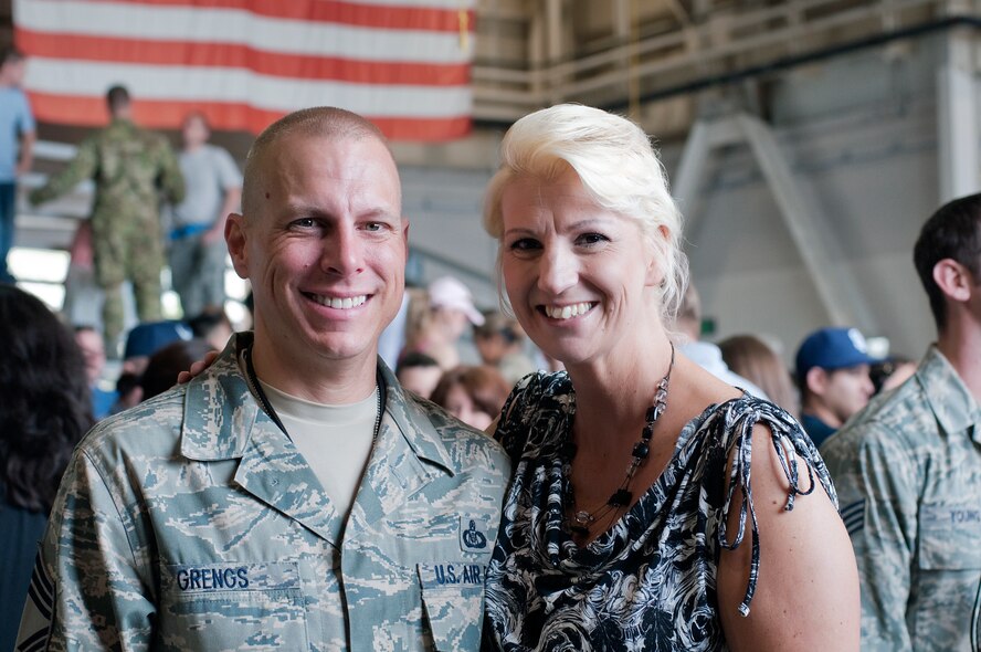 SPANGDAHLEM AIR BASE, Germany- Chief Master Sgt. Matthew Grengs, 52nd Fighter Wing command chief, was welcomed home from his deployment in 2012 by his wife, Estelle.  Chief Grengs has served in the U.S. Air Force for 23 years. (Courtesy photo/Released)
