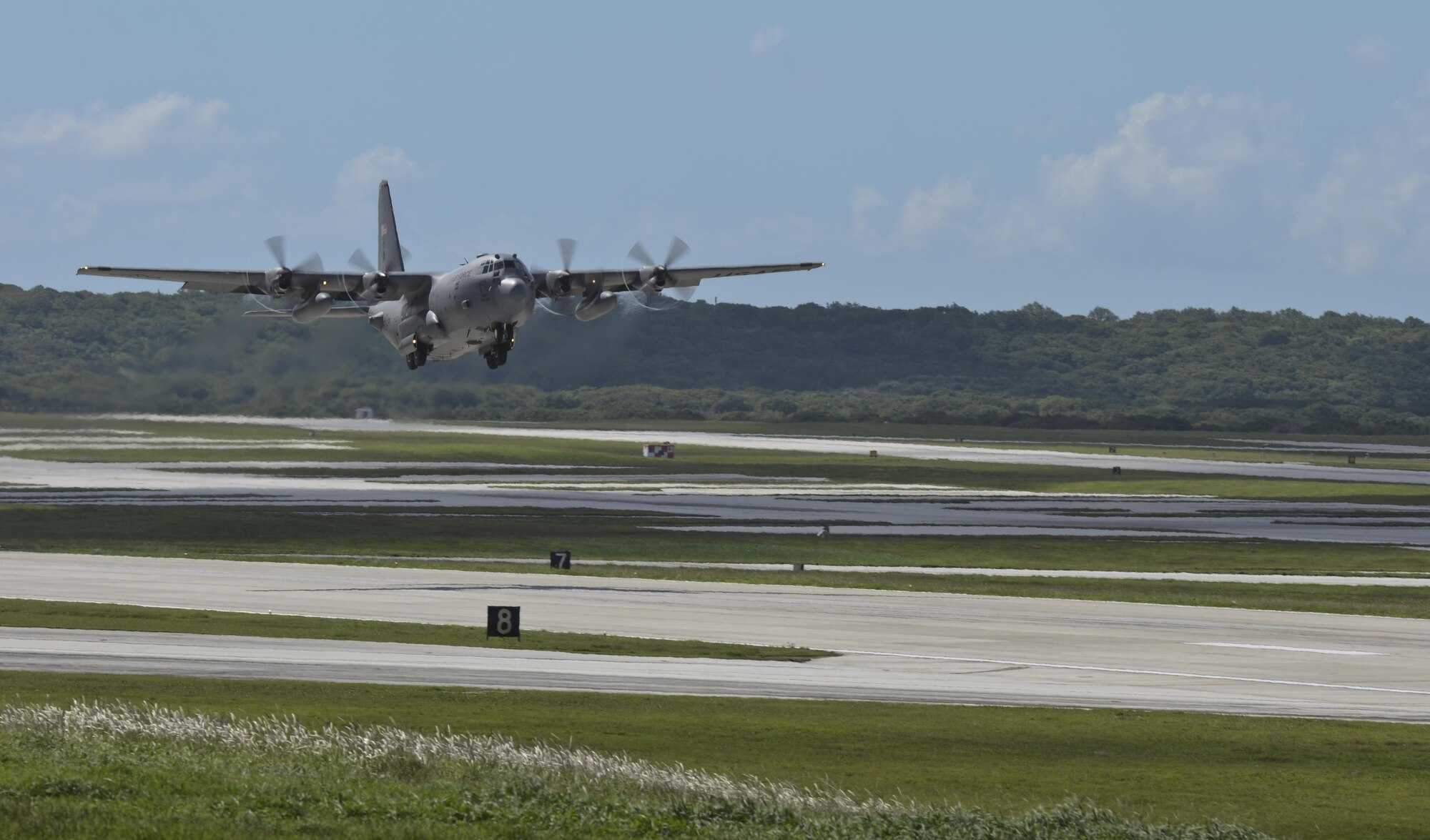 A C-130 Hercules takes off from Andersen Air Force Base, Guam, Nov. 14, 2013, transporting Airmen and equipment in support of Operation Damayan. Operation Damayan is a U.S. humanitarian aid and disaster relief effort to support the Philippines in the wake of the devastating effects of Typhoon Haiyan. (U.S. Air Force photo by Senior Airman Marianique Santos/Released)