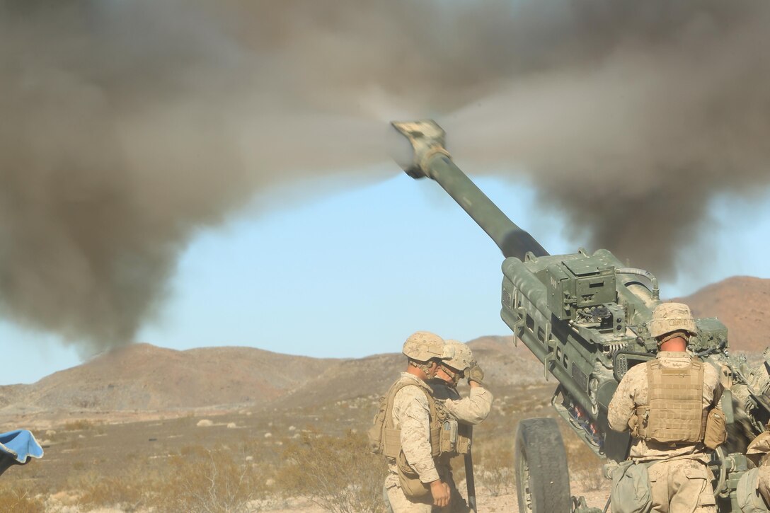 Marines with I Battery, 3/12, 1st Battalion, 11th Marines, 11th Marine Regiment, 1st Marine Division (Reinforced), fire an M777 Howitzer during an artillery suppression support exercise in support of the Integrated Training Exercise aboard the Combat Center Nov. 13, 2013. (Official Marine Corps photo by Lance Cpl. Paul S. Martinez/Released)