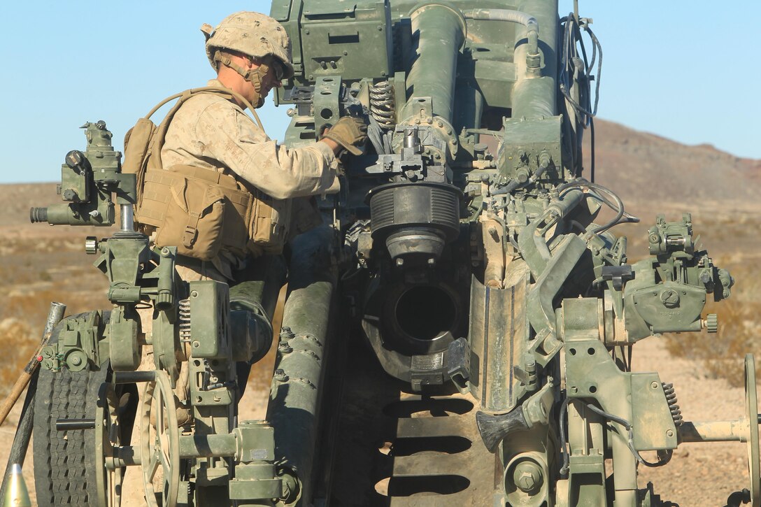 Marines with I Battery, 3/12, 1st Battalion, 11th Marines, 11th Marine Regiment, 1st Marine Division (Reinforced), prepare to fire an M777 Howitzer during an artillery suppression support exercise in support of the Integrated Training Exercise aboard the Combat Center Nov. 13, 2013. (Official Marine Corps photo by Lance Cpl. Paul S. Martinez/Released)
