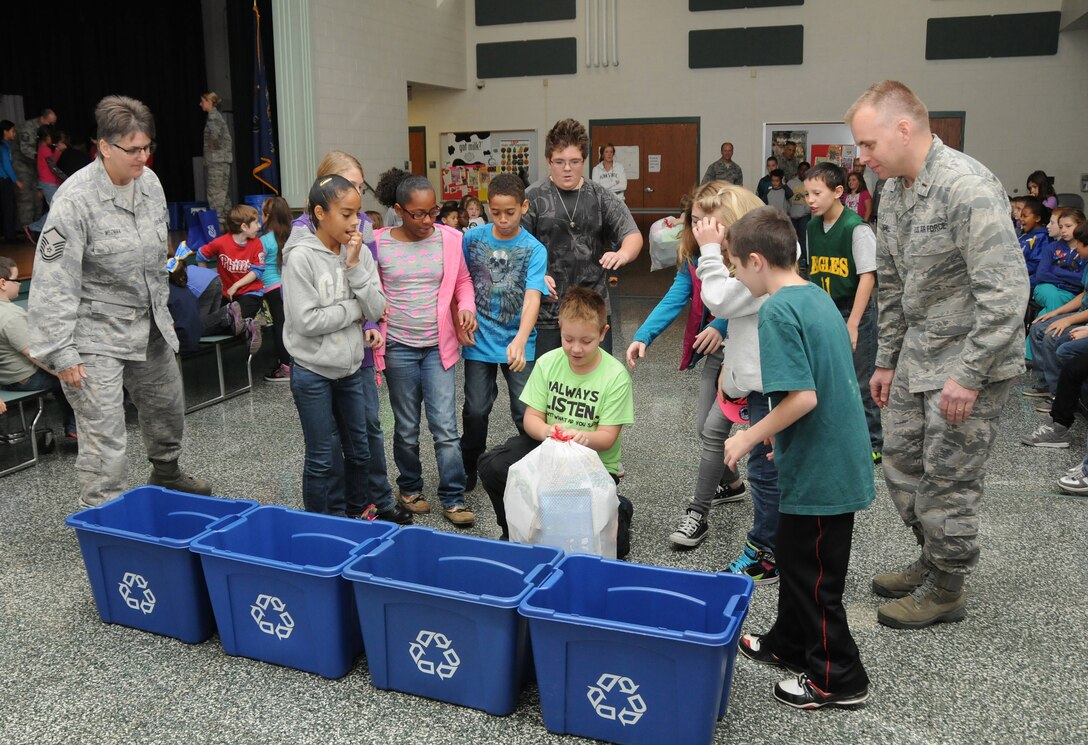 Students at Fink Elementary School, Middletown, Pa., prepare to start their recycling race Nov. 15, competing with fellow students to see who sorted recyclable items fastest. The race was hosted by volunteers from the 193rd Special Operations Wing in conjunction with America Recycles Day. (U.S. Air National Guard photo by Staff Sgt. Susan Penning/Released)  