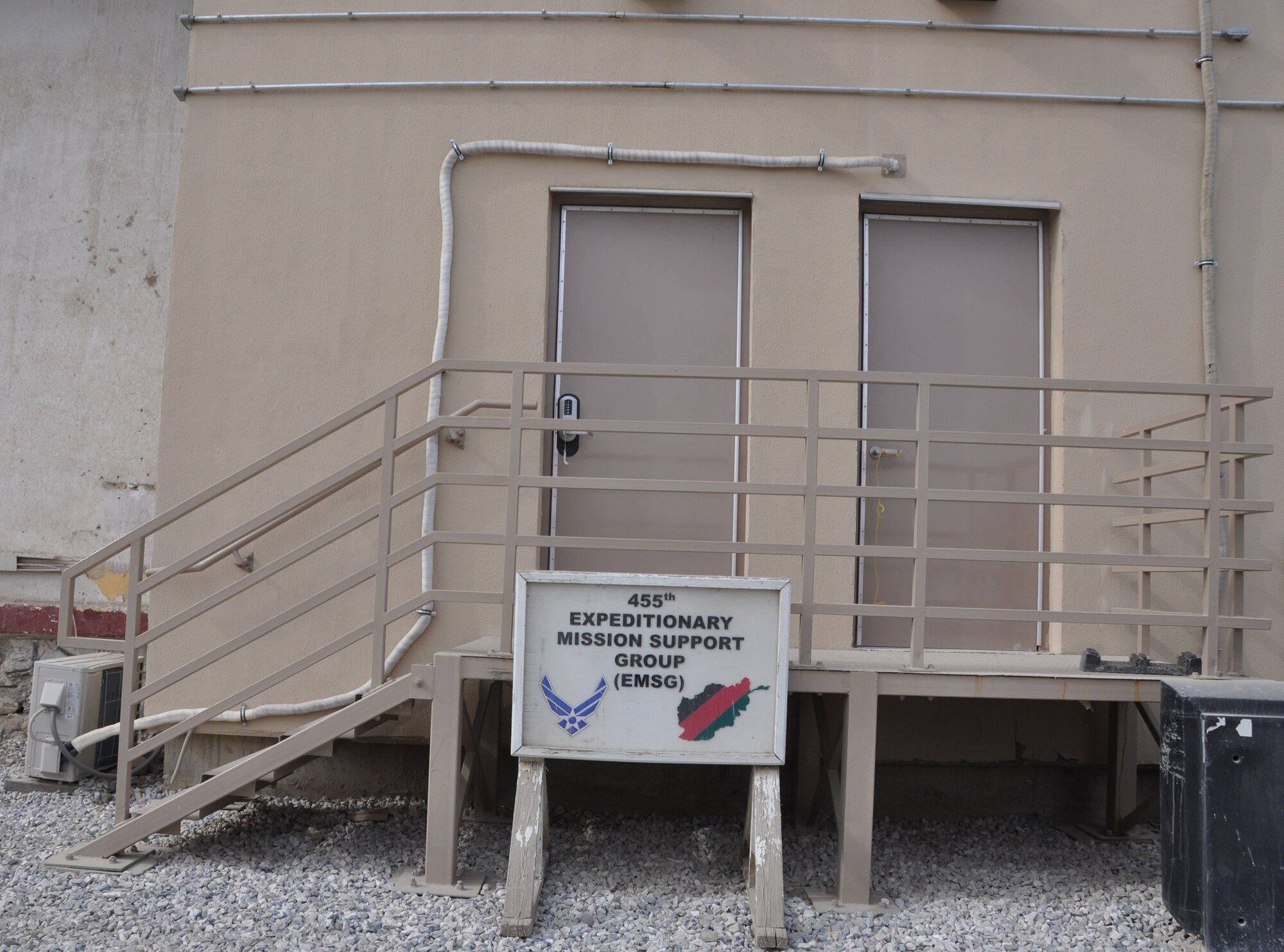 The 455th Expeditionary Mission Support Group staff recently relocated from an expeditionary tent in Camp Cunningham to a new hardened facility next to the old Russian control tower on Bagram Airfield, Afghanistan, Nov. 15-17, 2013. (U.S. Air Force photo/Tech. Sgt. Rob Hazelett)