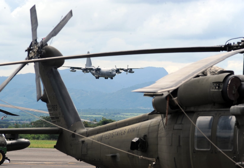 A C-130 Hercules airplane approaches the runway at Soto Cano Air Base, Honduras, Nov. 15, 2013.  The aircraft was at Soto Cano to participate in a training exercise being conducted by U.S. Special Forces at the base.  (Photo by Martin Chahin)