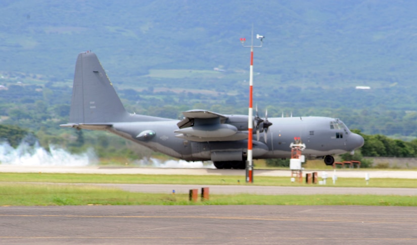 A C-130 Hercules airplane touches down on the runway at Soto Cano Air Base, Honduras, Nov. 15, 2013.  The aircraft was at Soto Cano to participate in a training exercise being conducted by U.S. Special Forces at the base.  (Photo by Martin Chahin)
