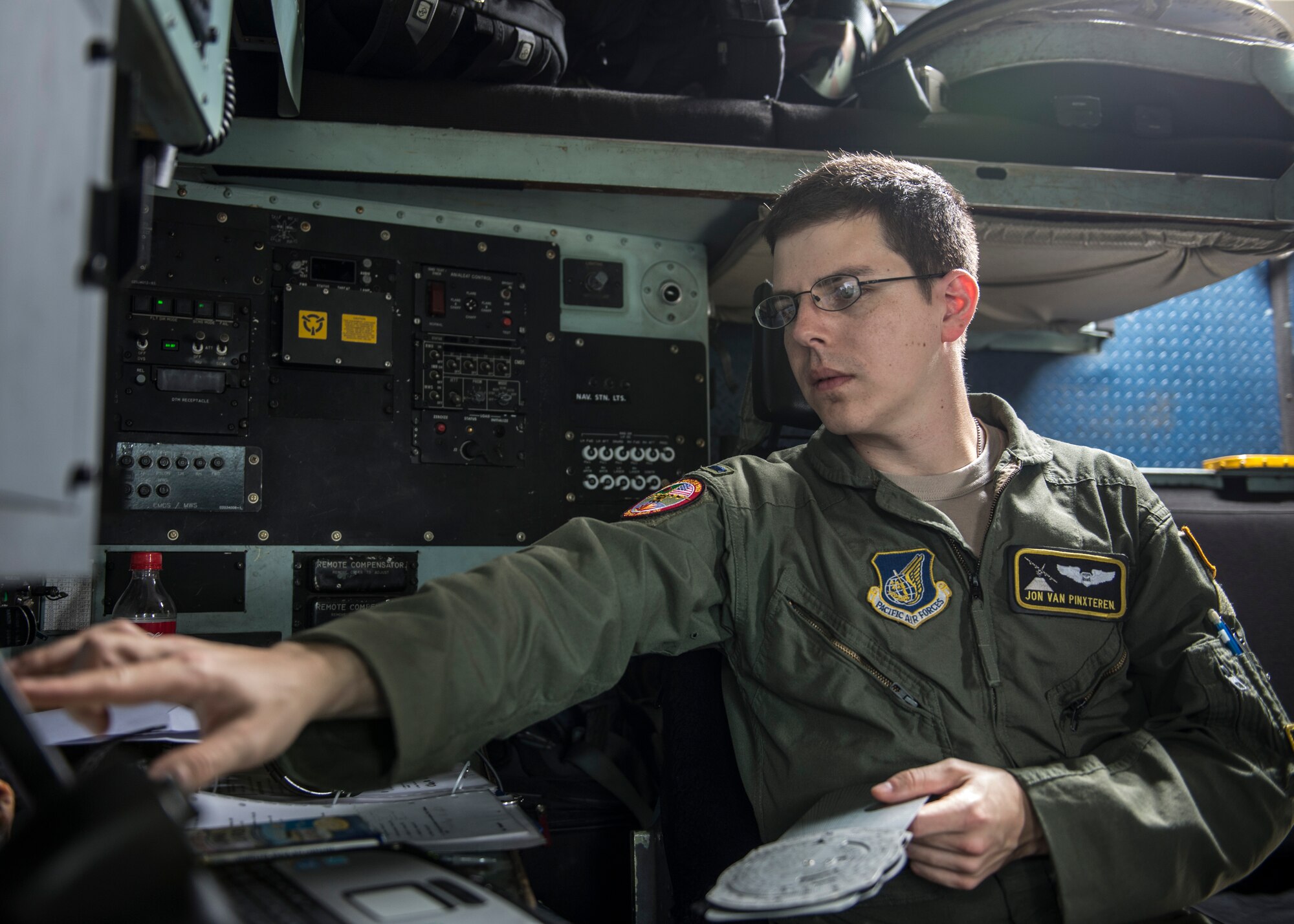 1st Lt. Jon Van Pinxteren, 36th Airlift Squadron navigator, plots a course for Clark Air Base, Republic of the Philippines, at U-Taphao Airport, Thailand, Nov. 16, 2013. Van Pinxteren and approximately 80 other Airmen from Yokota Air Base, Japan, were returning from exercise Cope South in Bangladesh when they were redirected to the real-world humanitarian aid mission, Operation Damayan, a multi-national relief effort to assist the Philippine government’s response to the aftermath of Super Typhoon Haiyan/Yolanda. (U.S. Air Force photo by Captain Raymond Geoffroy/Released)