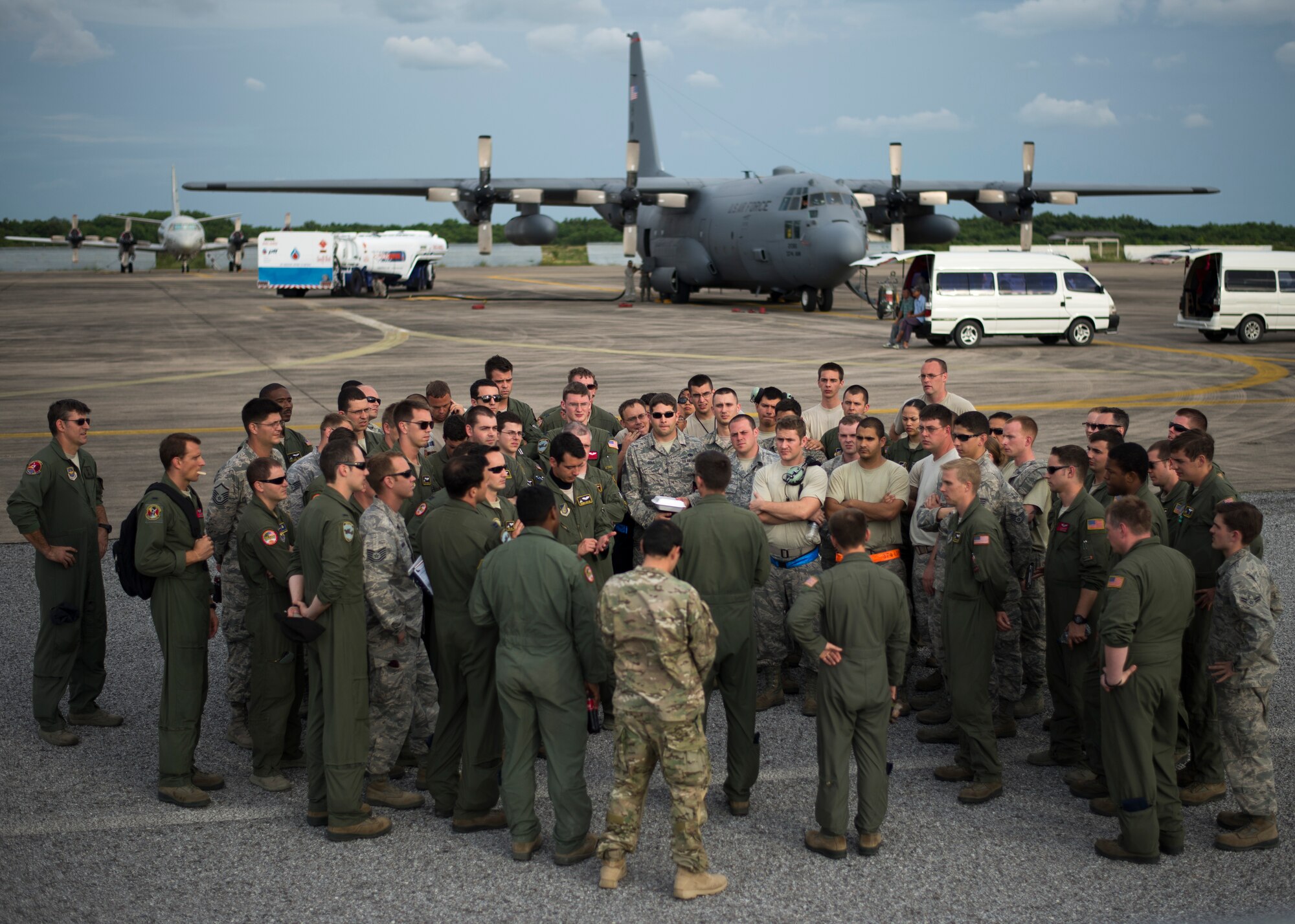 Lt. Col. Jeff Menasco, 36th Airlift Squadron commander, briefs a team of Airmen from Yokota Air Base, Japan, on their mission to support the disaster relief effort in the Republic of the Philippines at U-Taphao Airport, Thailand, Nov. 15, 2013. The Airmen were returning from exercise Cope South in Bangladesh when they were redirected to the real-world humanitarian aid mission, Operation Damayan, to assist the Philippine government’s response to the aftermath of Super Typhoon Haiyan/Yolanda. (U.S. Air Force photo by Captain Raymond Geoffroy/Released)