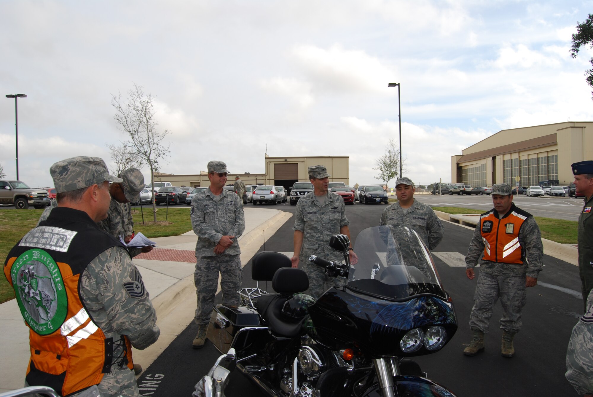 Col. Jeffrey T. Pennington, 433rd Airlift Wing commander, conducts the annual Commander Motorycle Safety briefing prior to riders departing Joint Base San Antonio-Lackland for a ride to Bandera, Texas  on Nov. 16, 2013. (U.S. Air Force Photo/Capt. Philip Cortez)