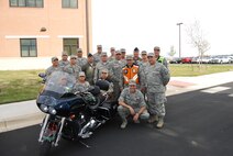 Members of the 433rd Airlift Wing participate in the inaugural Motocycle Safety Ride. 
