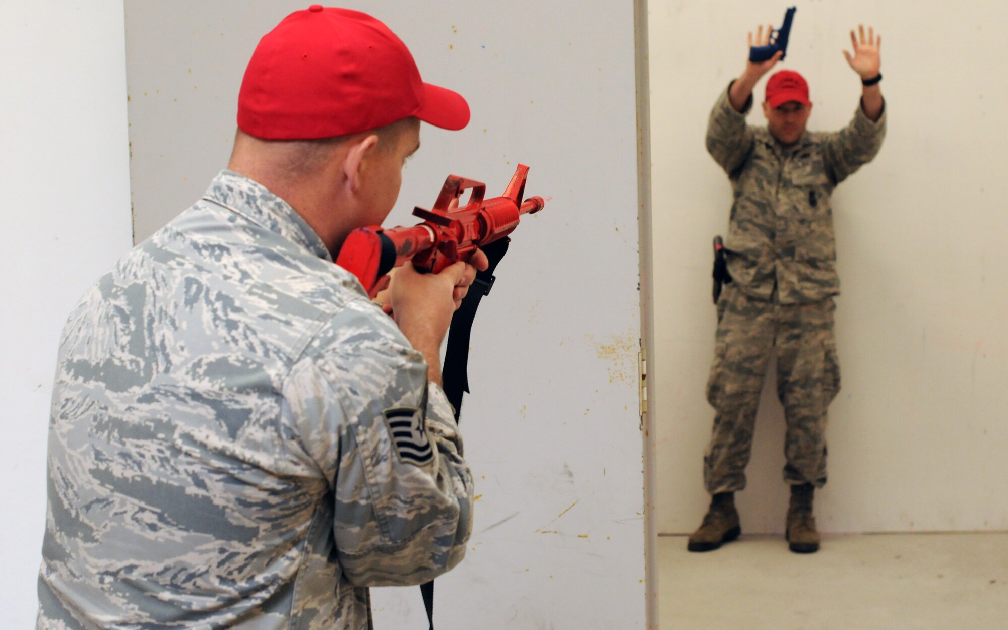 A picture of Airmen from the 177th Security Forces Squadron practicing room clearing procedures.