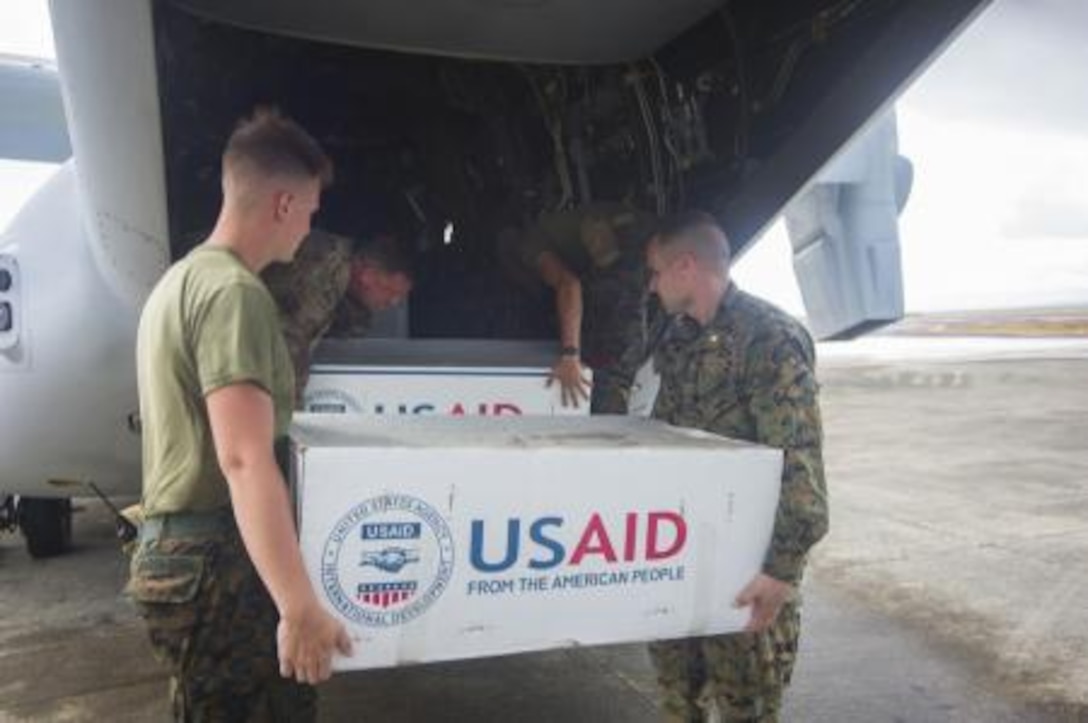 Marines and U.S. Army Soldiers load supplies onto an MV-22 Osprey assigned to the Marine Medium Tiltrotor Squadron 261, 1st Marine Aircraft Wing, in support of Operation Damayan. The George Washington Strike Group supports the 3rd Marine Expeditionary Brigade to assist the Philippine government in response to the aftermath of Super Typhoon Haiyan/Yolanda in the Republic of the Philippines.