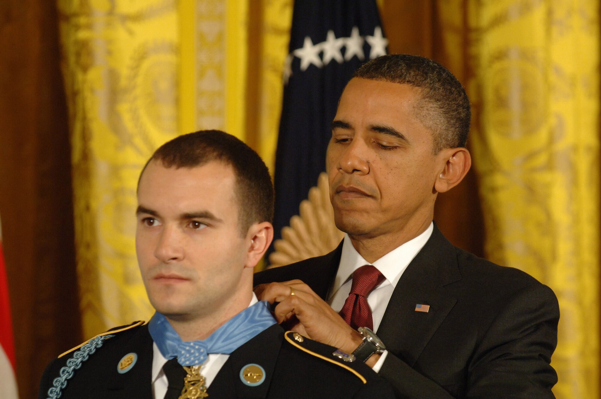 President Barack Obama presents the Medal of Honor to Staff Sgt. Sal Giunta during a ceremony at the White House Nov. 16, 2010. Giunta rescued two members of his squad while conducting a patrol under the cover of darkness in Korengal Valley, Afghanistan in October 2007. (U.S. Army file photo)
