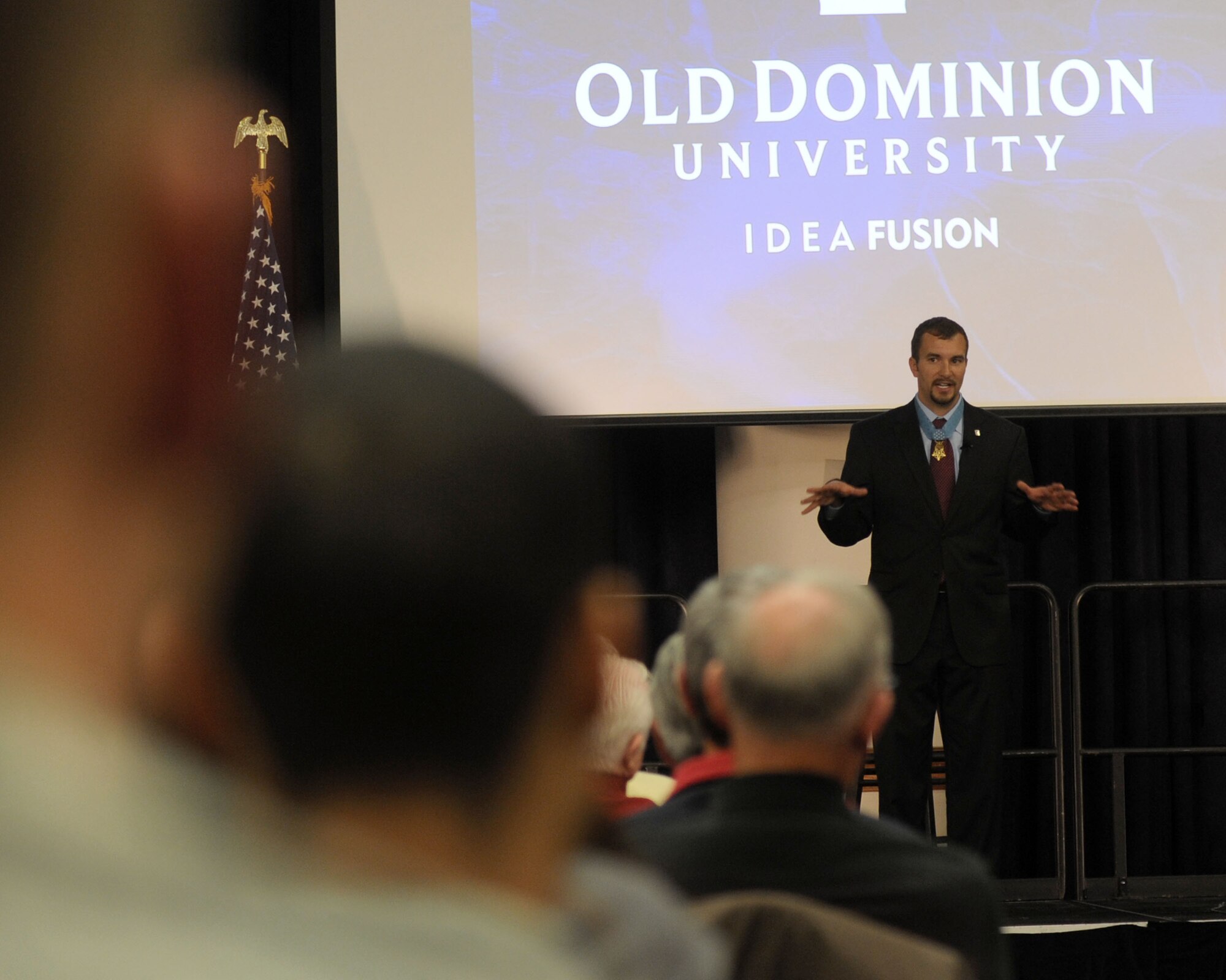Medal of Honor recipient Sal Giunta, former U.S. Army staff sergeant, speaks about his military experiences at Old Dominion University in Norfolk, Va., Nov. 14. Giunta is currently one of only 13 recipients to receive the medal for actions in Iraq or Afghanistan. (U.S. Air Force photo by Airman 1st Class R. Alex Durbin/Released)
