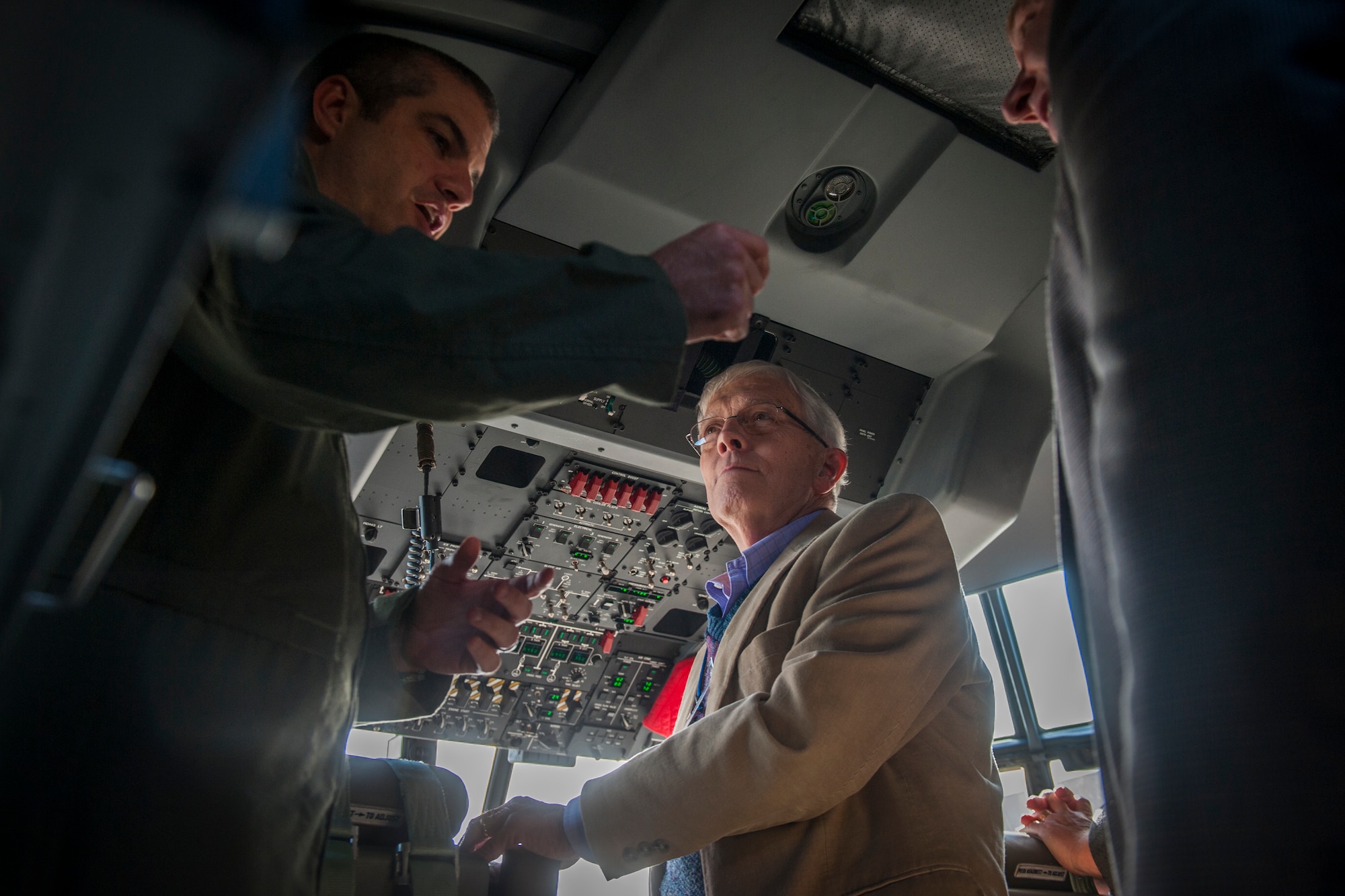 U.S. Air Force Maj. Eric Lipp, 71st Rescue Squadron assistant director of operations, talks to the Rev. David Tart, Park Avenue United Methodist Church pastor of visitation, about the HC-130J Combat King II at Moody Air Force Base, Ga., Nov. 14, 2013. The HC-130J tour was part of Partners for Spiritual Fitness for Moody Warriors, which aims to create more partnership between the Moody Chapel and local churches. (U.S. Air Force photo by Senior Airman Jarrod Grammel/Released)
