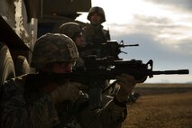 Members of the 791st Missile Security Forces Squadron convoy response force respond to hostile forces during a recapture, recovery exercise, Nov. 14, 2013. The purpose of this training is to maintain readiness for launch facility recapture. (U.S. Air Force photo/Senior Airman Brittany Y. Auld)