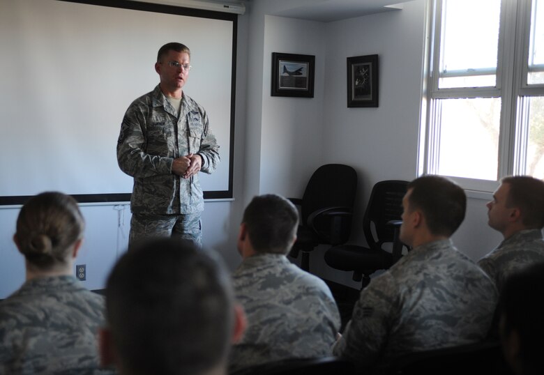 Chief Master Sgt. William Turner, Air Force Special Operations Command command chief, speaks to Cannon Air Commandos attending the Airman Leadership School Nov. 13, 2013, at Cannon Air Force Base, N.M. Turner visited in order to observe Cannon’s progress as a special operations base and interact with Cannon’s Air Commando’s. (U.S. Air Force photo/Senior Airman Ericka Engblom)