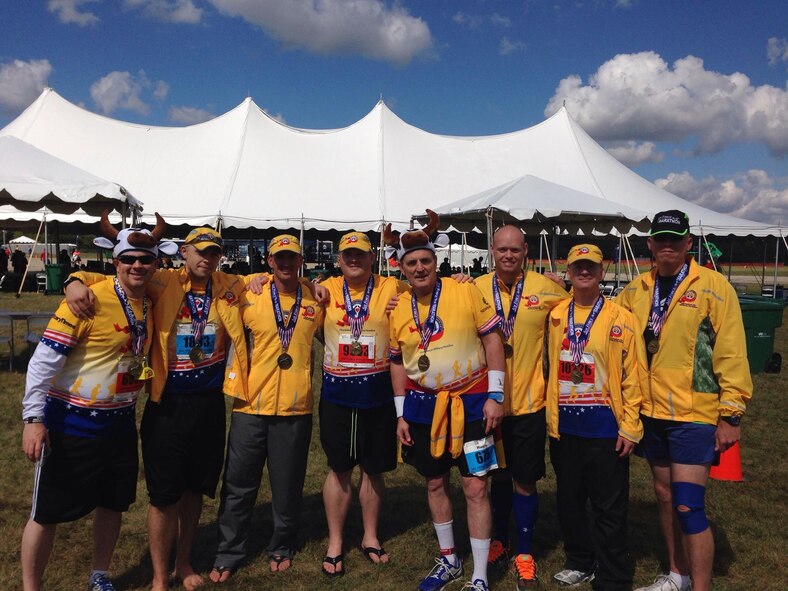 Minot Air Force Base’s 705th Munitions Squadron’s “Team Shockwave” pose for a picture before partcipating in the 17th Annual U.S. Air Force Marathon in Dayton, Ohio, Sept. 21, 2013. In addition to fundraising enough money to make the trip, the team donated $4,823 to The Fisher House, making it the second-largest donation to the foundation during the marathon. (Courtesy photo)