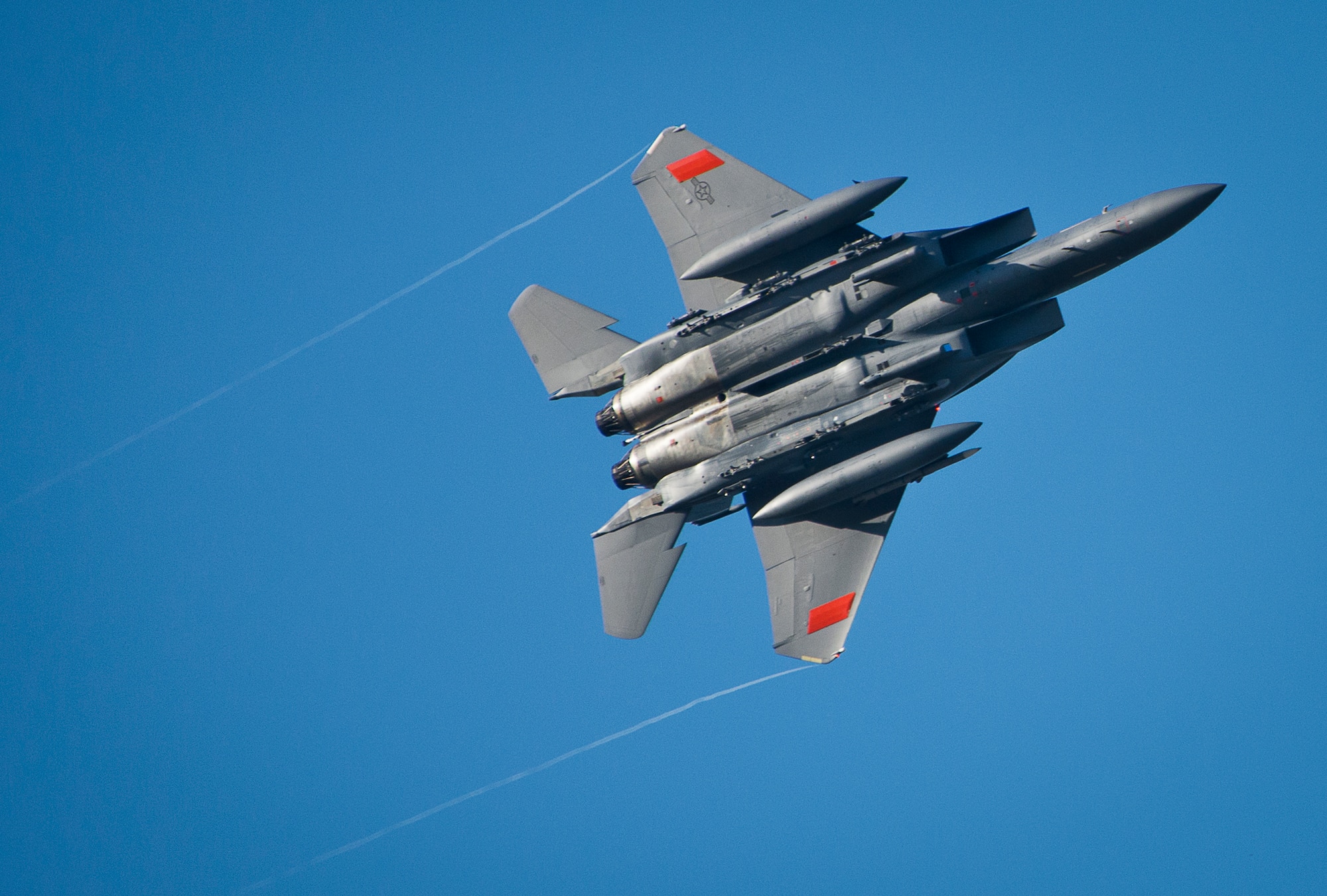 An F-15 from the 40th Flight Test Squadron soars over the base flightline after a training sortie at Eglin Air Force Base, Fla.  The 40th FTS is responsible for developmental flight testing for F-15s, F-16s and A-10s for the 96th Test Wing.  (U.S. Air Force photo/Samuel King Jr.)