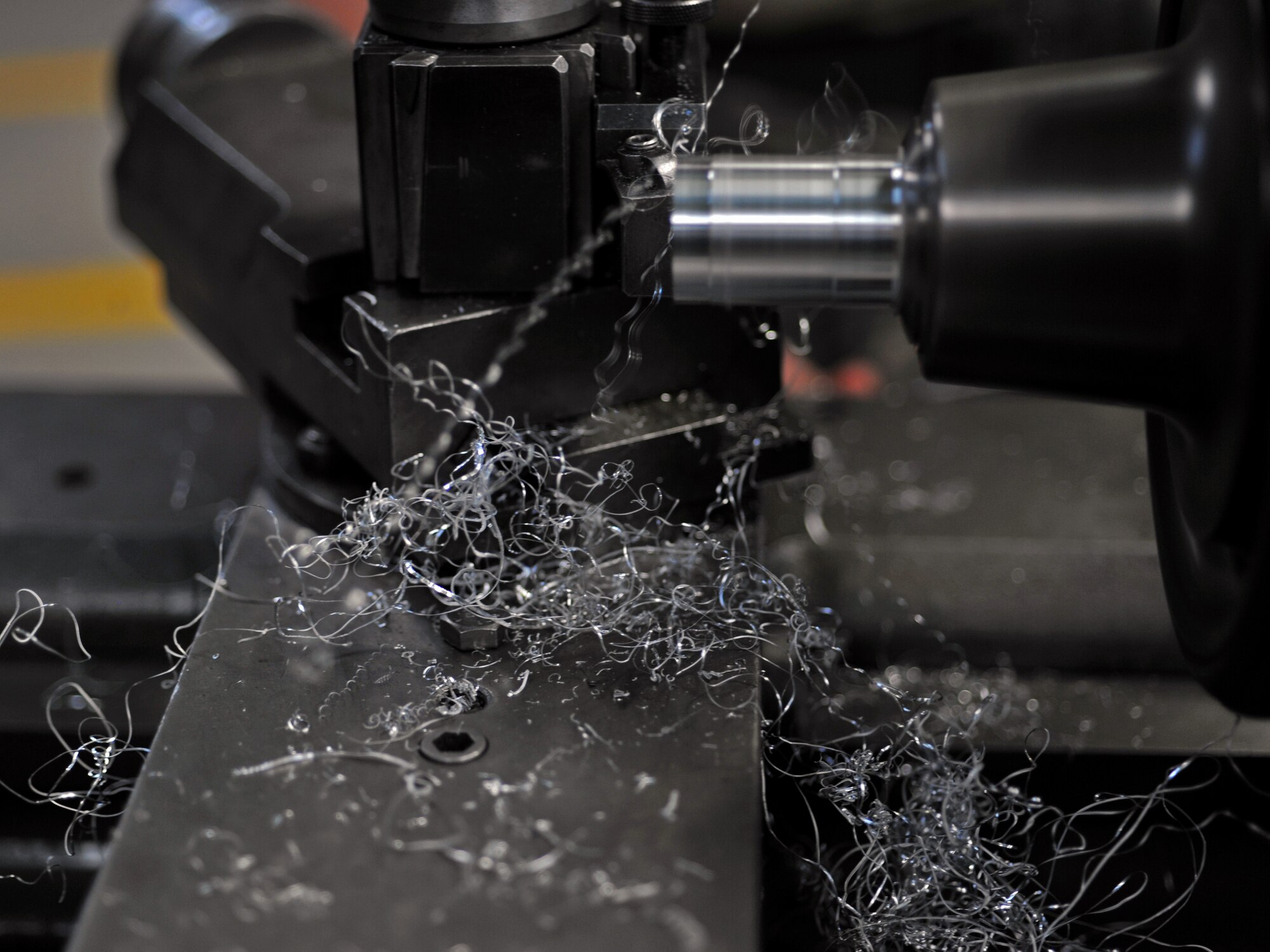 Senior Airman Nicholas Creech, 51st Maintenance Squadron aircraft metals technology journeyman, faces a piece of aluminum during Operational Readiness Exercise Beverly Bulldog 14-01 at Osan Air Base, Republic of Korea, Nov. 18, 2013. Some of the work done by the shop includes creating tools uniquely sized for the A-10 Thunderbolt and F-16 Fighting Falcon. (U.S. Air Force photo/Senior Airman Siuta B. Ika)