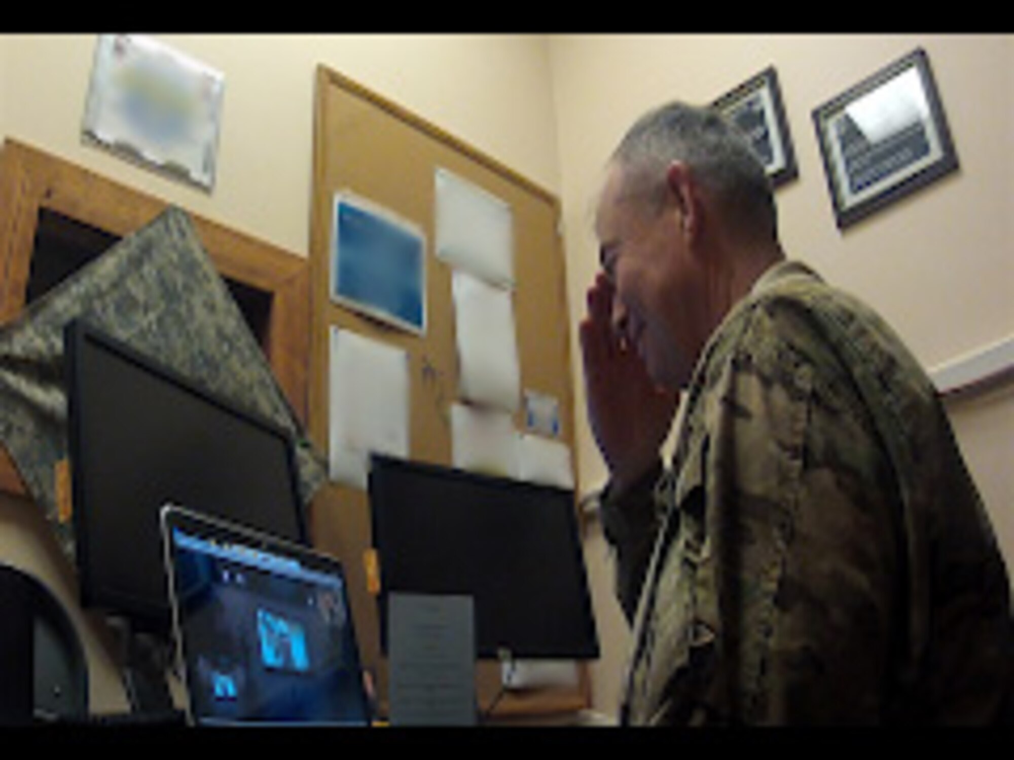 Chaplain (Lt. Col.) David Mansberger, 455th Air Expeditionary Wing head chaplain, officiated Matthew and Kellie Raferty’s wedding via Skype while being deployed to Bagram Airfield, Afghanistan, Nov. 17, 2013. (U.S. Air Force photo)