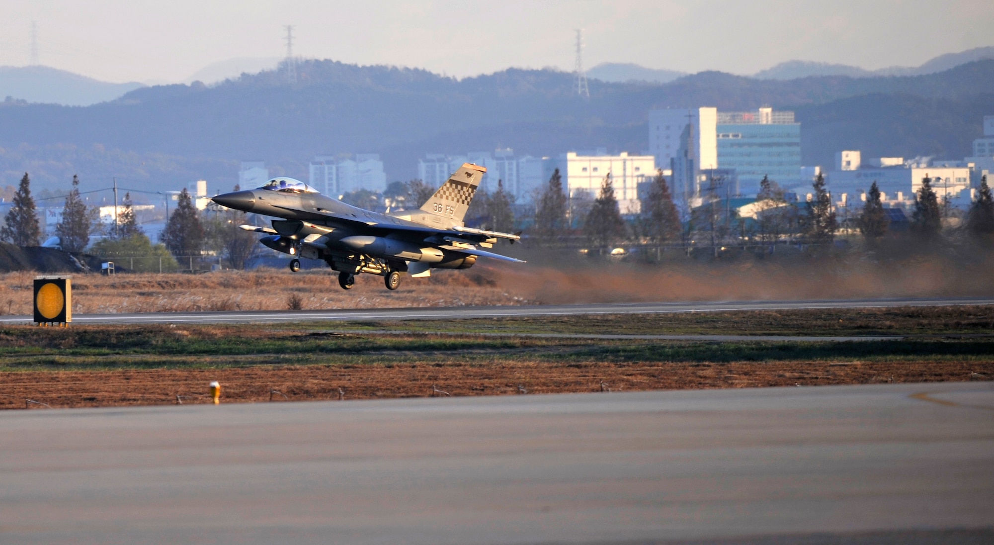 An F-16 Fighting Falcon from the 36th Fighter Squadron takes off during the first sortie of Operational Readiness Exercise Beverly Bulldog 14-01 at Osan Air Base, Republic of Korea, Nov. 18, 2013. Osan participates in these exercises so Airmen can demonstrate their capabilities and ability to perform in heightened awareness situations. (U.S. Air Force photo/Staff Sgt. Emerson Nuñez)