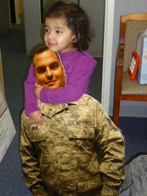 The Red Cross, in partnership with the Airman & Family Readiness Center, offers Flat Daddies and Mommies, which are cardboard picture cutouts of a family member deployed, at Faircild Air Force Base, Wash. (Courtesty Photo)