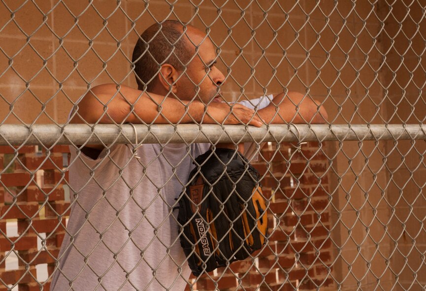 U.S. Air Force Col. Edward Ford, 23d Mission Support Group commander, watches as his team plays defense at Moody Air Force Base, Ga., Nov. 15, 2013. Despite a rocky start, the Eagles scored 4 runs during the 5th inning. (U.S. Air Force photo by Airman 1st Class Alexis Grotz/Released)