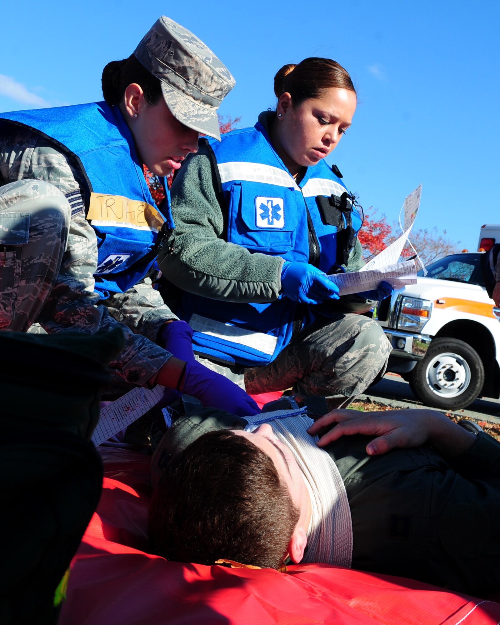U.S. Air Force Airmen tend to the injured during an active-shooter exercise at Langley Air Force Base, Va., Nov. 19, 2013. The exercise gave medical personnel the opportunity to practice real-world emergency procedures in a controlled environment.  (U.S. Air Force photo by Airman Areca T. Wilson/Released)