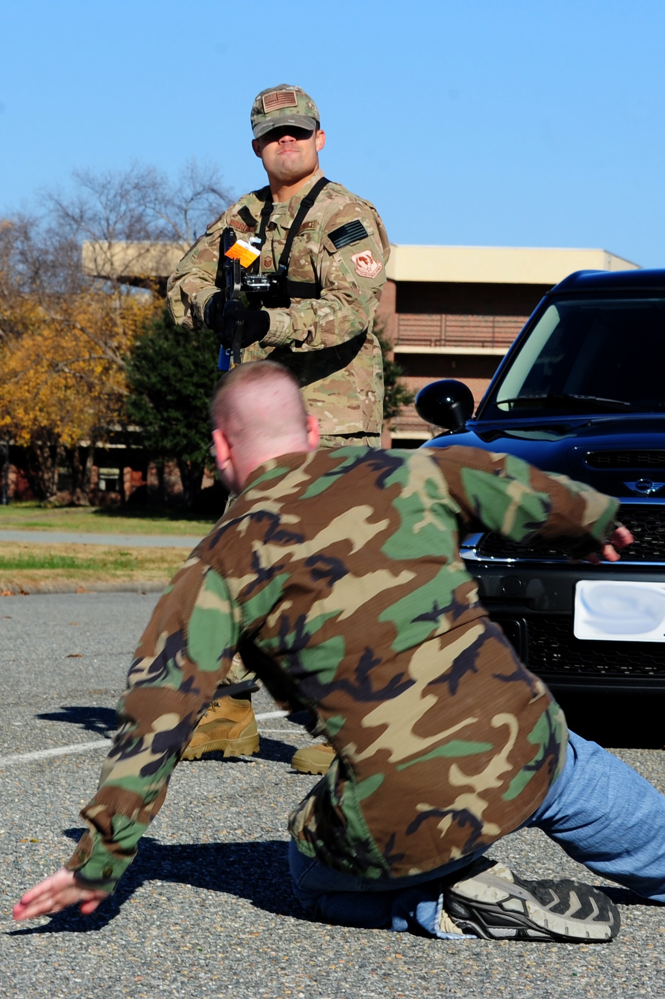 U.S. Air Force Master Sgt. Scott Wagonblott, 633rd Communications Squadron information assurance manager, poses as a simulated active shooter during an exercise at Langley Air Force Base, Va., Nov. 19, 2013. The exercise tested the ability of personnel to handle possible active-shooter threats. (U.S. Air Force photo by Airman Areca T. Wilson/Released)