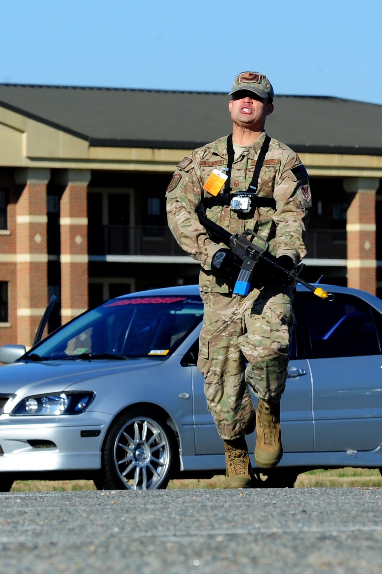 U.S. Air Force Master Sgt. Scott Wagonblott, 633rd Communications Squadron information assurance manager, poses as a simulated active shooter during an exercise at Langley Air Force Base, Va., Nov. 19, 2013. The exercise tested the ability of personnel to handle possible active-shooter threats. (U.S. Air Force photo by Airman Areca T. Wilson/Released)