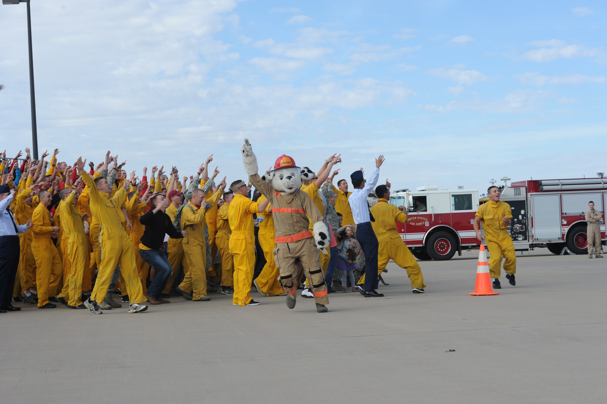 GOODFELLOW AIR FORCE BASE, Texas -- Members of the 312th Training Squadron cheer after winning the spirit award during the 17th Training Group’s quarterly drill competition at the 5th Annual Goodfellow Community Appreciation Day at the Louis F. Garland Department of Defense Fire Academy Nov. 16. Other awards presented were individual drill, open ranks, regulation drill and an overall award. (U.S. Air Force photo/ Staff Sgt. Laura R. McFarlane)
