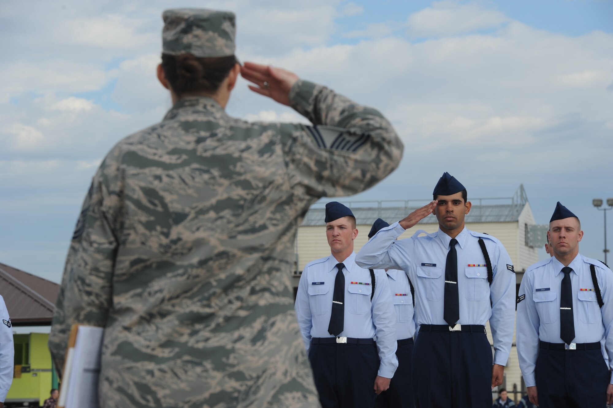 GOODFELLOW AIR FORCE BASE, Texas -- The 312th Training Squadron drill team receives permission to begin their regulation portion of the 17th Training Group’s quarterly drill competition during the 5th Annual Goodfellow Community Appreciation Day at the Louis F. Garland Department of Defense Fire Academy Nov. 16. The competition included regulation drill, exhibition drill and more. (U.S. Air Force photo/ Staff Sgt. Laura R. McFarlane)