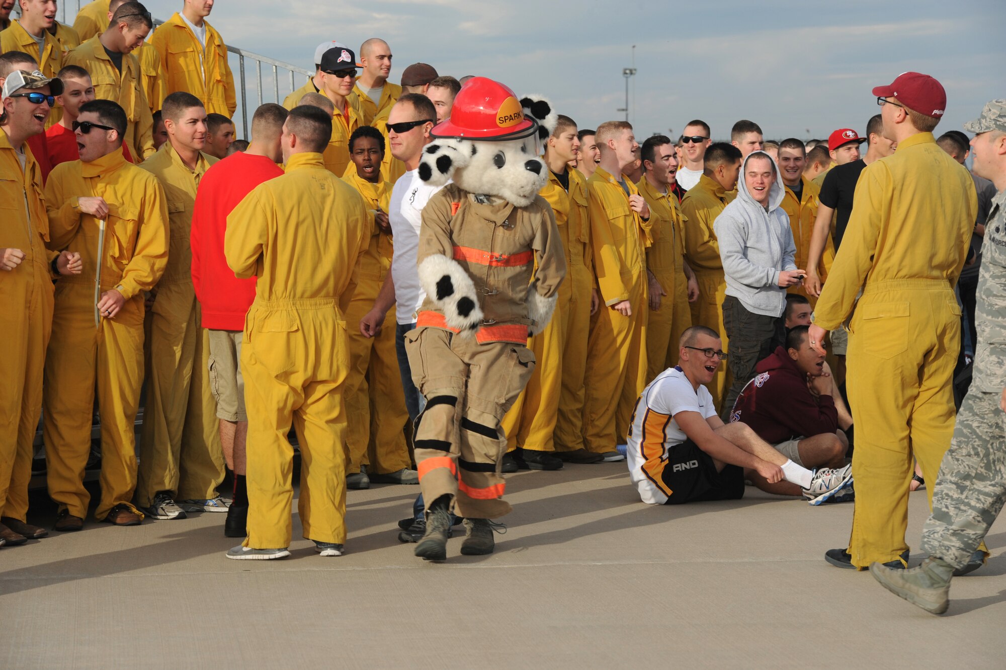 GOODFELLOW AIR FORCE BASE, Texas -- Sparky the Fire Dog,  312th Training Squadron mascot, dances during the 17th Training Group’s quarterly drill competition at the 5th Annual Goodfellow Community Appreciation Day at the Louis F. Garland Department of Defense Fire Academy Nov. 16. Awards were given at the end of the competition including the ‘spirit’ award, which the 312th TRS won. (U.S. Air Force photo/ Staff Sgt. Laura R. McFarlane)