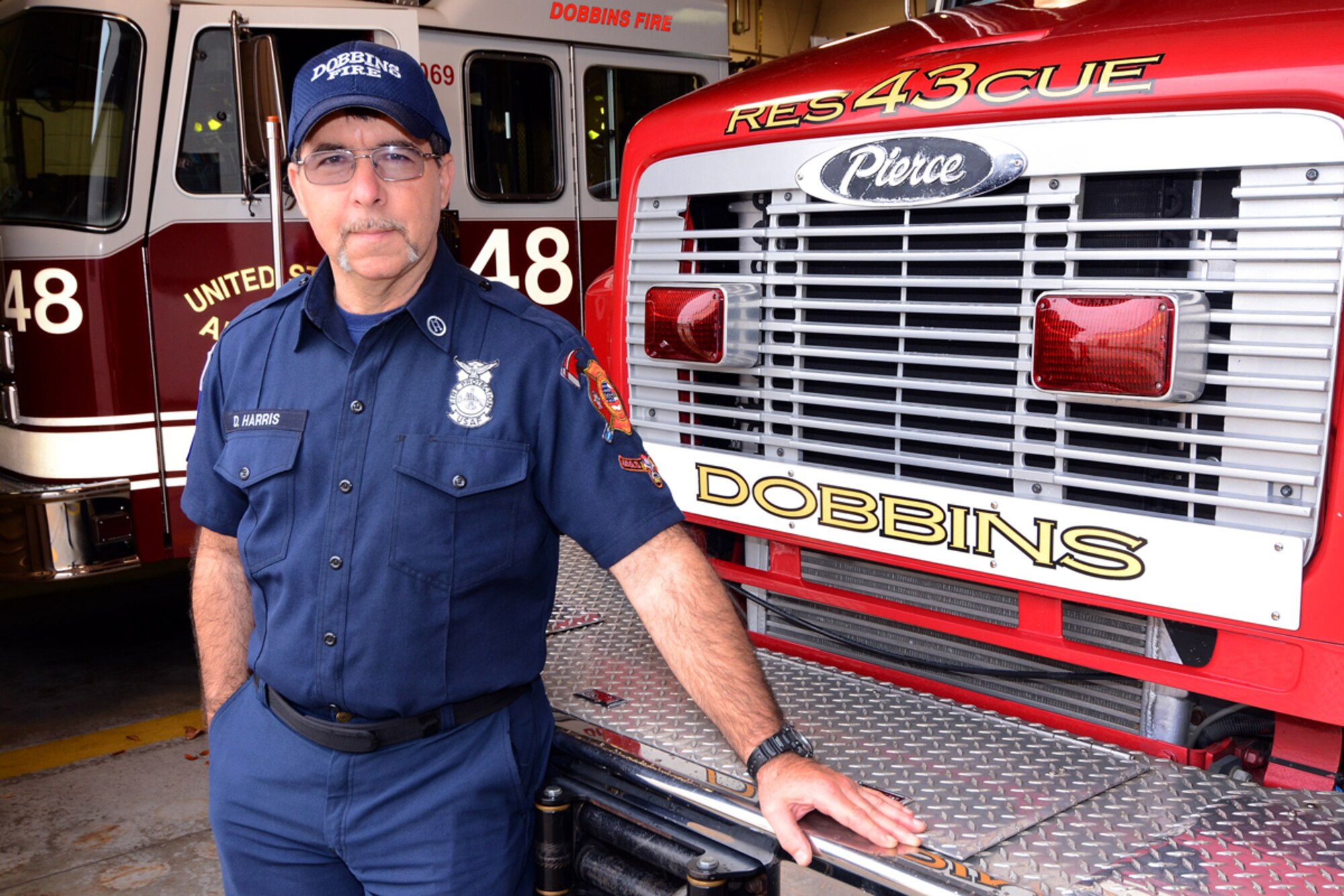 Daniel Harris of the Dobbins Fire Department was recently honored for 30 years of service to the federal government. After servins four years in the U.S. Air Force, Harris has worked as a civil servant at Castle Air Force Base, Ca., Mather AFB, Ca., Fort Rucker Al. and Dobbins Air Reserve Base, Ga. (U.S. Air Force photo/Brad Fallin) 