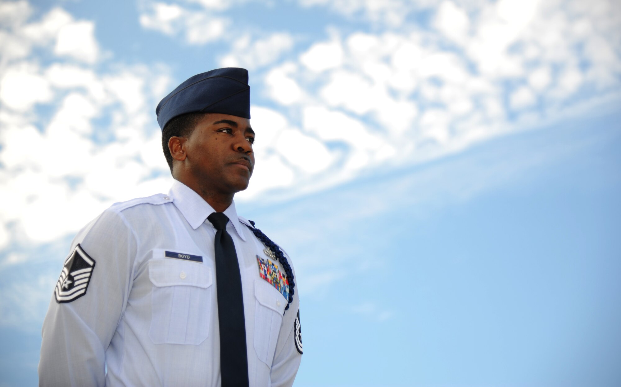 Master Sgt. Terrance Boyd, 334th Training Squadron flight chief military training flight, stands at attention Nov. 18, 2013, at Avery Manor, Keesler Air Force Base, Miss.  Boyd was recently selected as the 2013 Air Education and Training Command junior enlisted category Lance P. Sijan award winner.  (U.S. Air Force photo by Kemberly Groue)