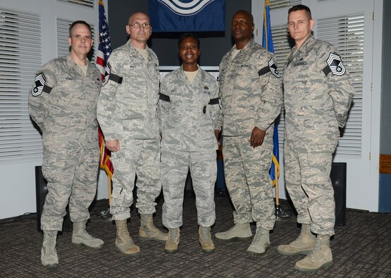 [Left to Right] U.S. Air Force Senior Master Sgts. John Roberts, 20th Maintenance Group operations superintendent, William Whitt, U.S. Air Forces Central Command logistics fuels superintendent, Ellen Jones, 20th Security Forces Squadron operations superintendent, Frankie Moore Jr., 20th Equipment Maintenance Squadron lead production superintendent, and Steven McClure, U.S. AFCENT logistics fuels operations, pose for a photo at the chief master sergeant select ceremony at Shaw Air Force Base, S.C., Nov. 14, 2013.  The five selectees have earned the highest rank an enlisted Airman can achieve, awarded to only 1 percent of the total enlisted force. (U.S. Air Force photo by Airman 1st Class Jonathan Bass/Released)