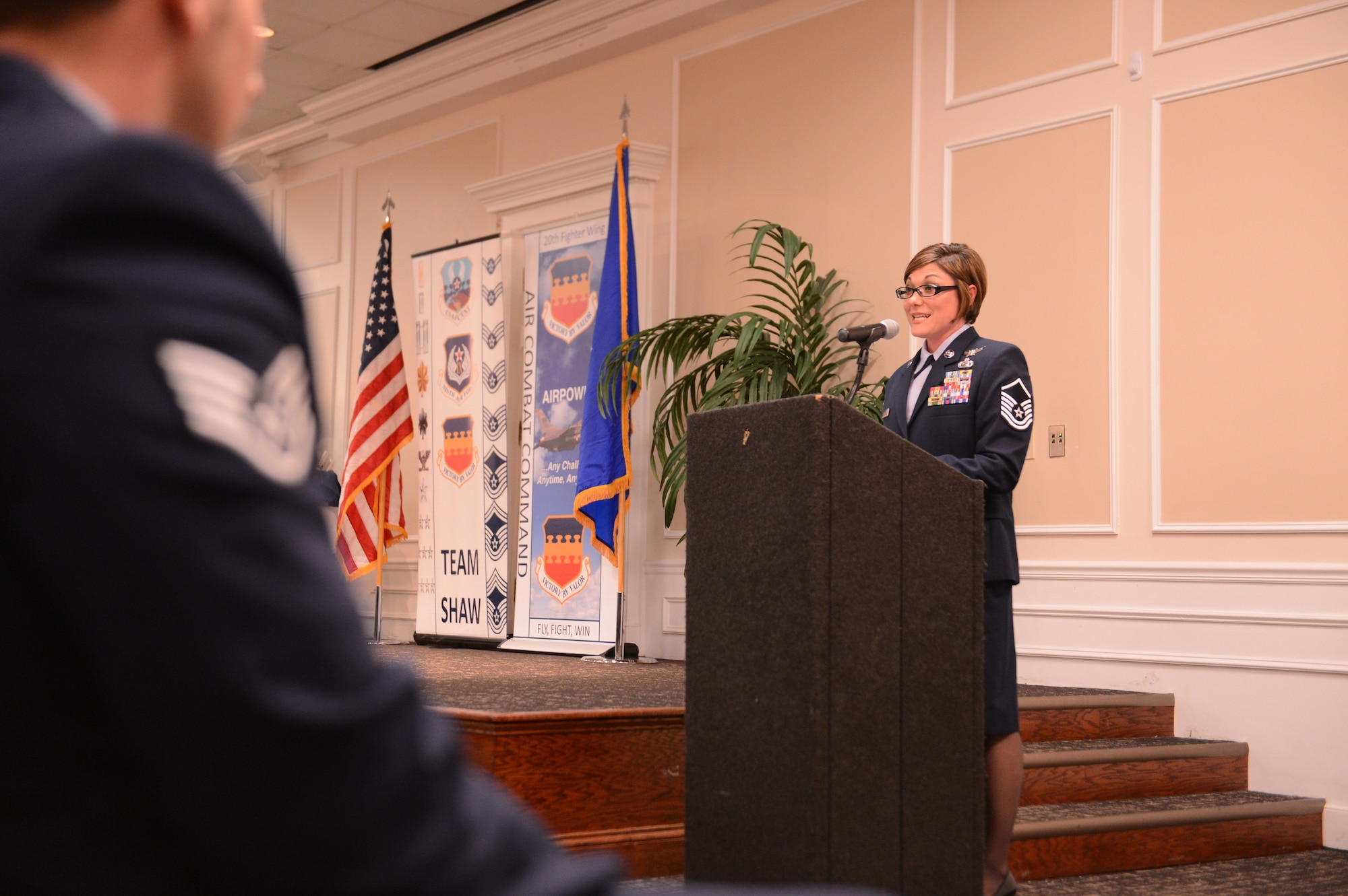 U.S. Air Force Master Sgt. Angela Marcoux, 31st Intelligence Squadron, Detachment 1 imagery support element chief, speaks to the Community College of the Air Force graduating class at Shaw Air Force Base, S.C., Nov. 14, 2013. Marcoux spoke to the graduates on how to strategically further their career. (U.S. Air Force photo by Senior Airman Tabatha Zarrella/Released)