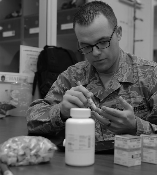 U.S. Air Force Senior Airman Eric Blanton, 7th Operations Support Squadron, pricks his finger to test his blood sugar levels Nov. 18, 2013, at Dyess Air Force Base, Texas. Blanton was diagnosed with type-one diabetes in April. In order to keep his glucose levels in the correct range, he must test his levels six times a day and take numerous medications. (U.S. Air Force photo by Airman 1st Class Autumn Velez/Released)