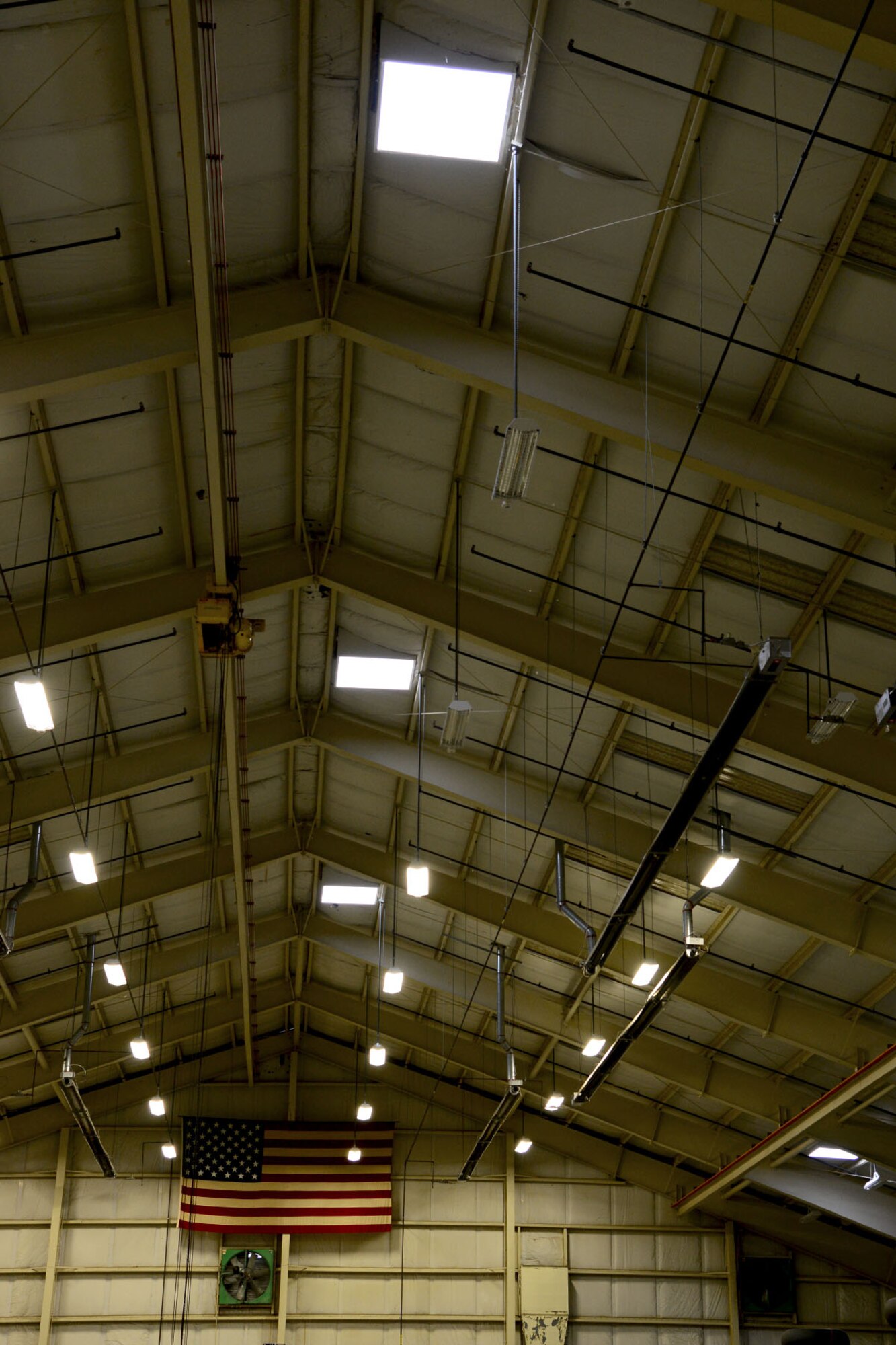 Solar-tracking skylights, seen here in hangar 2418 at Fort Eustis, Va., track the sun as it moves and enables light in the building to remain in the same spot. The skylights are based on the photovoltaic system, which uses the sun as a power source. (U.S. Air Force photo by Staff Sgt. Ashley Hawkins/Released)