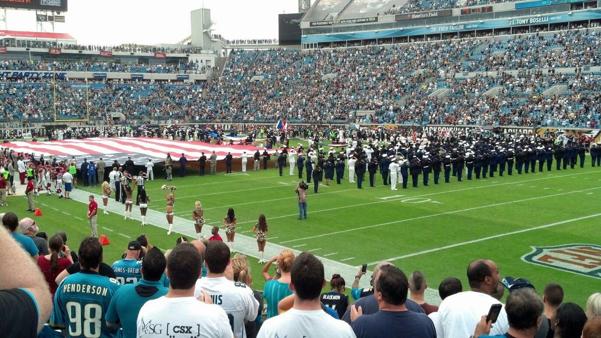Approximately 100 Tyndall Airmen participated in a flag ceremony Nov. 17 during a NFL Jacksonville Jaguar game at EverBank Field, Jacksonville, Fla. (Courtesy photo by Ken Anderson)