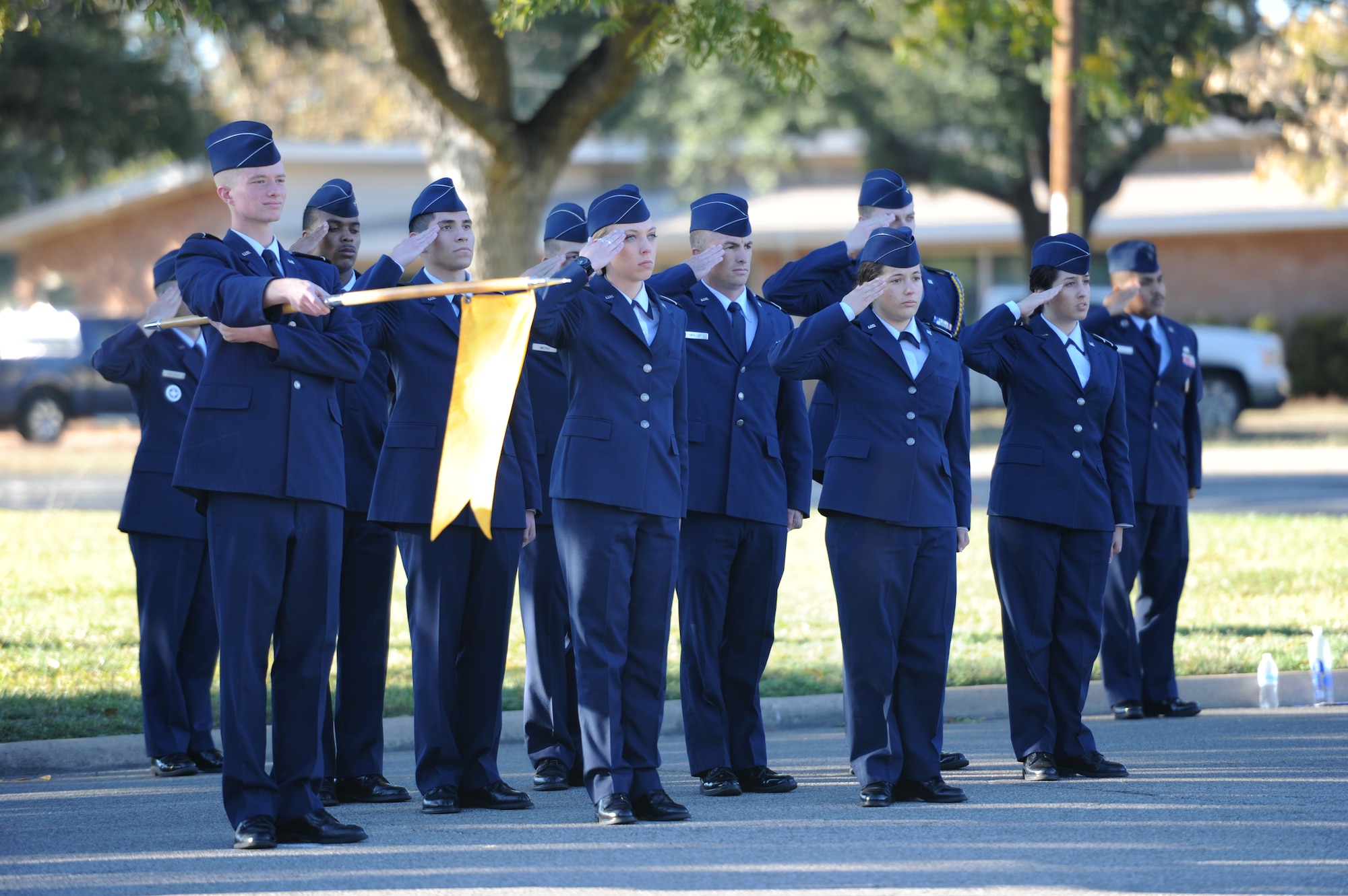 SAN ANGELO, Texas -- Angelo State University ROTC cadets salute during the retreat portion of the Veterans’ Vigil at ASU Nov. 13. The vigil honored 30 ASU graduates who gave their lives for this country during World War II and to all former and current service members. (U.S. Air Force photo/ Staff Sgt. Laura R. McFarlane)