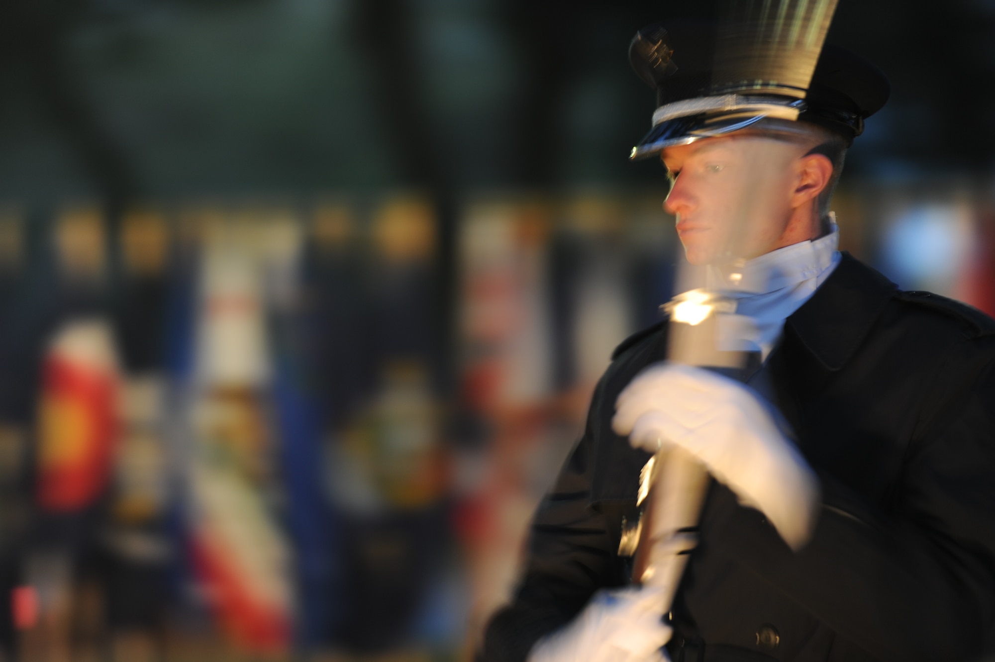 SAN ANGELO, Texas -- Angelo State University ROTC Cadet Spencer Christian guards the Oak Grove Memorial during the candlelight vigil portion of the Veterans’ Vigil at Angelo State University Nov. 13. The guarding was an emulation of the guard at the Tomb of the Unknown Soldier in Washington D.C. (U.S. Air Force photo/ Staff Sgt. Laura R. McFarlane)