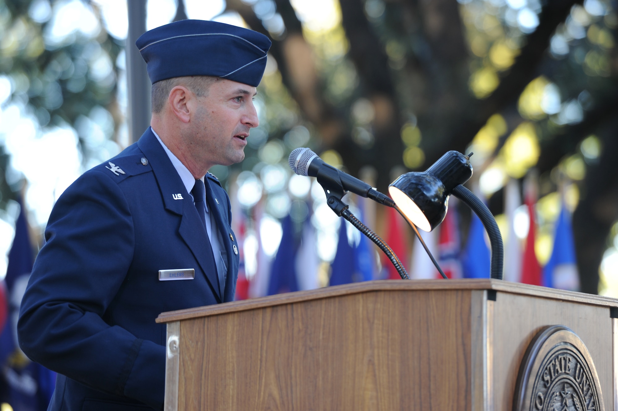 SAN ANGELO, Texas -- Retired Colonel (Dr.) Robert Ehlers, Angelo State University professor of security studies, gives a speech at the candlelight vigil opening ceremony during the Veterans’ Vigil at ASU’s Oak Grove Memorial Nov. 13. The evening began with a retreat ceremony at the flag pole in front of the ASU administration building immediately followed by the vigil to honor Veterans. (U.S. Air Force photo/ Staff Sgt. Laura R. McFarlane)