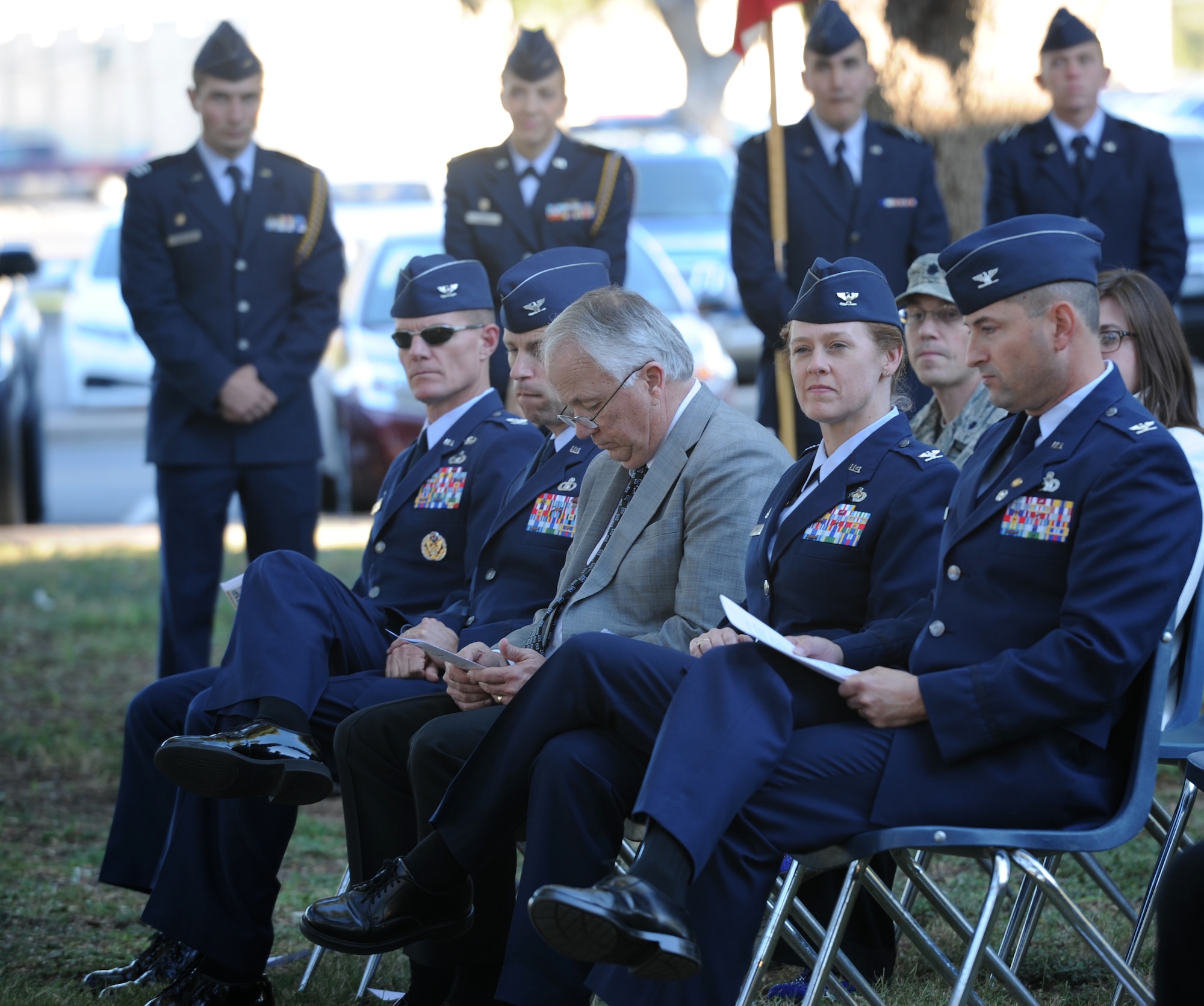 SAN ANGELO, Texas -- Leadership from Goodfellow Air Force Base attend a candlelight vigil opening ceremony during the Veterans’ Vigil at the Angelo State University Oak Grove Memorial Nov. 13. The vigil honored 30 ASU graduates who gave their lives for their country during World War II as well as all former and current service members. (U.S. Air Force photo/ Staff Sgt. Laura R. McFarlane)