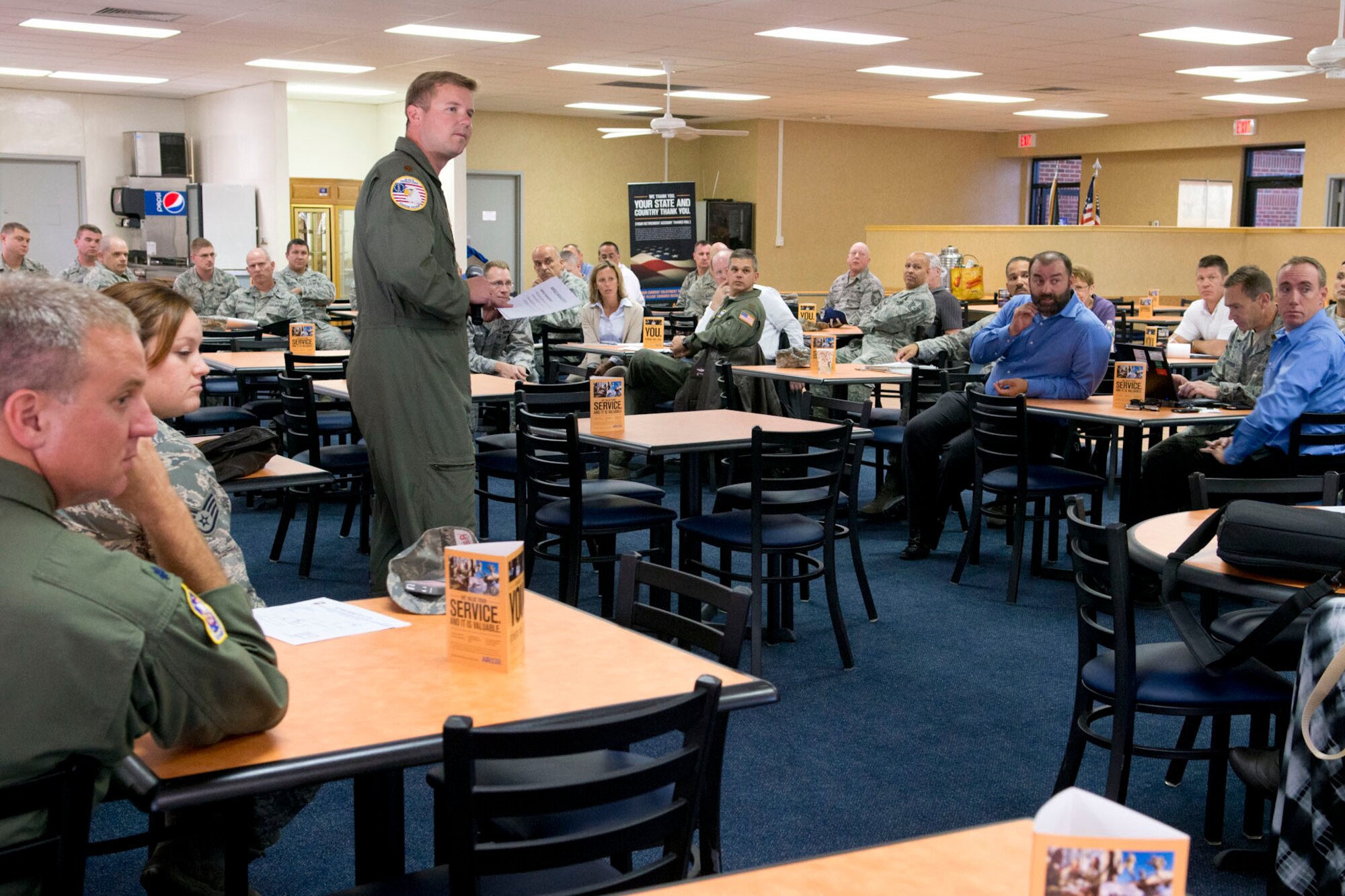 Maj. Douglas Dickson, NGBA3MS, fields questions at the Site Action Task Force outbrief Oct. 31. Dickson worked with the operations group during the SATAF to determine action items for the unit's converison to C-17 aircraft (Air National Guard photo by Master Sgt. Emily Beightol-Deyerle)