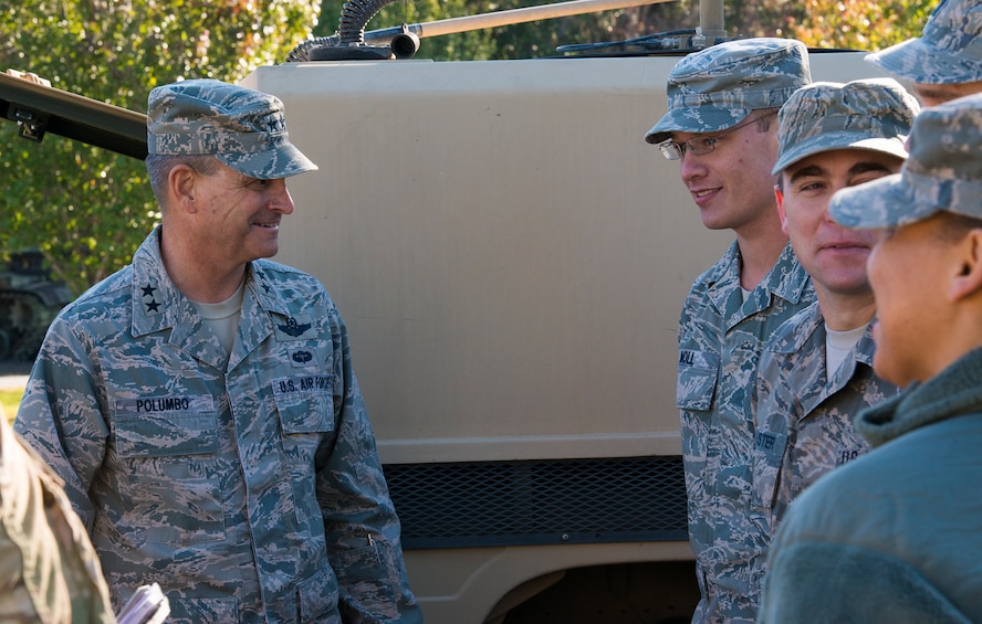 U.S. Air Force Maj. Gen Jake Polumbo, Ninth Air Force commander, greets Airmen at Grand Bay Bombing and Gunnery Range during a visit to Moody Air Force Base, Ga., Nov. 14, 2013. Polumbo met with tactical air control party airmen for a demonstration of their equipment and capabilities. (U.S. Air Force photo by Airman 1st Class Ryan Callaghan/Released)
