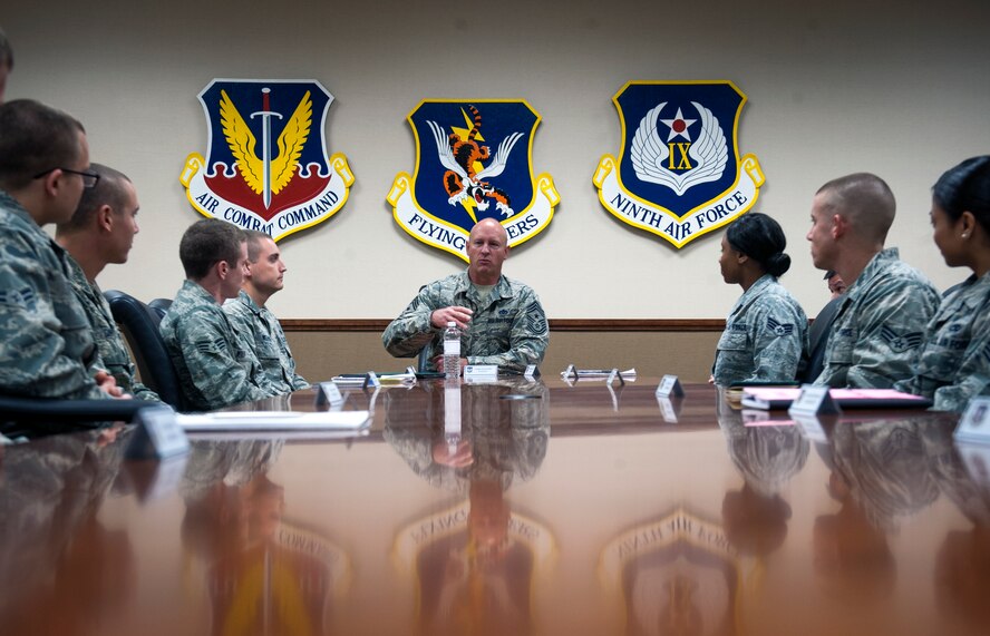 U.S. Air Force Chief Master Sgt. Scott Fuller, Ninth Air Force command chief, speaks to Airmen during an Airman’s forum at Moody Air Force Base, Ga., Nov. 13, 2013. This forum and an NCO forum was part of a visit by the 9th AF commander and command chief. (U.S. Air Force photo by Senior Airman Jarrod Grammel/Released)
