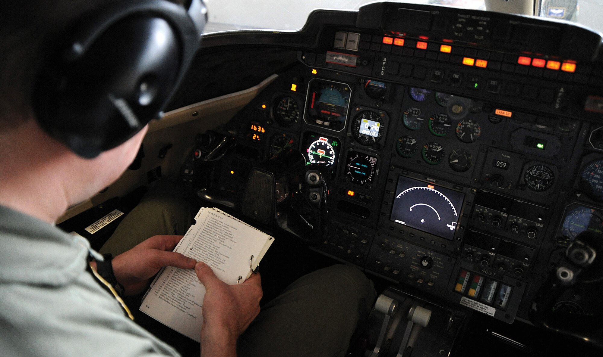 Capt Joseph Waddell, 458th Airlift
Squadron pilot, goes over his preflight
check-lists during pre-flight
inspections at Scott AFB, Ill.
USAF photo by SrA Tristin English