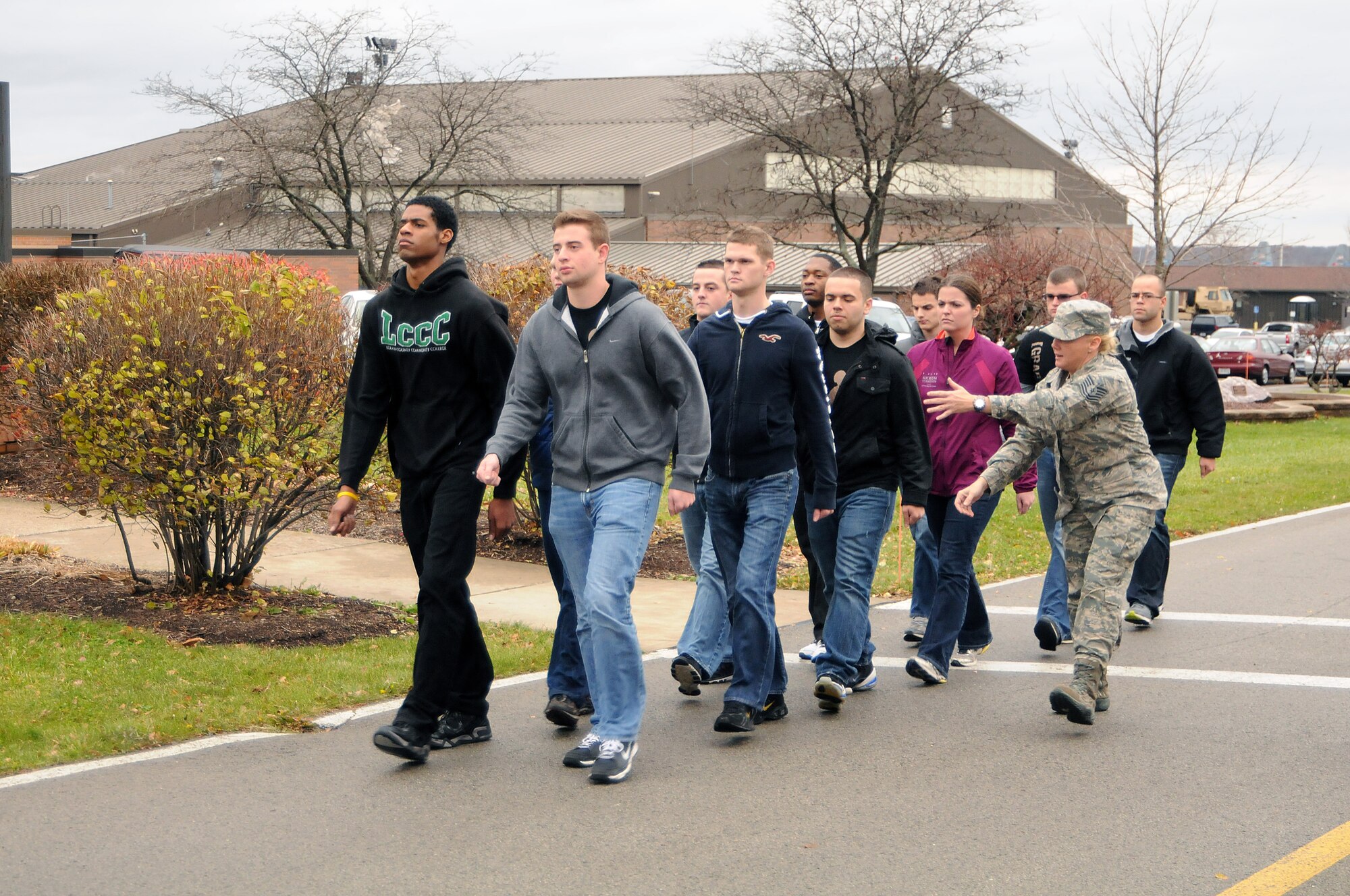 YOUNGSTOWN AIR RESERVE STATION, Ohio—U.S. Air Force Reserve Technical Sgt. Kalee Lint, NCOIC of the 910AW Development and Training Flight, instructs future Airmen in the fundamentals of marching on Sunday, Nov. 17, 2013, here. Lint mentors trainees with the 910th Airlift Wing Development and Training Flight here to prepare them for the rigors of basic military training. (U.S. Air Force photo/ TSgt Rick Lisum)