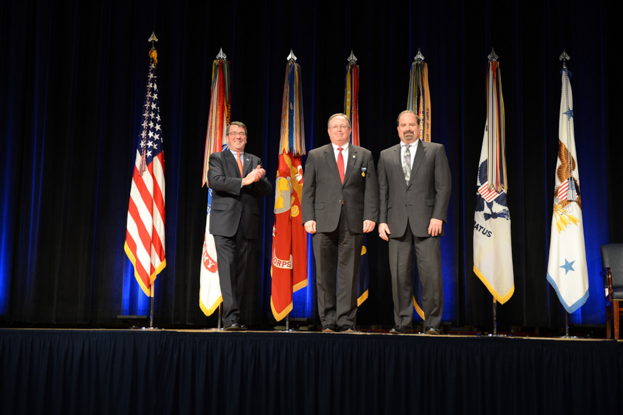 Senior Executive Service member Scott Jack, former director, communications and information, Air Force Global Strike Command receives the Department of Defense Distinguished Civilian Service Award from Deputy Defense Secretary Ash Carter in a ceremony in Washington, D.C., Nov. 18. (Department of Defense courtesy photo)